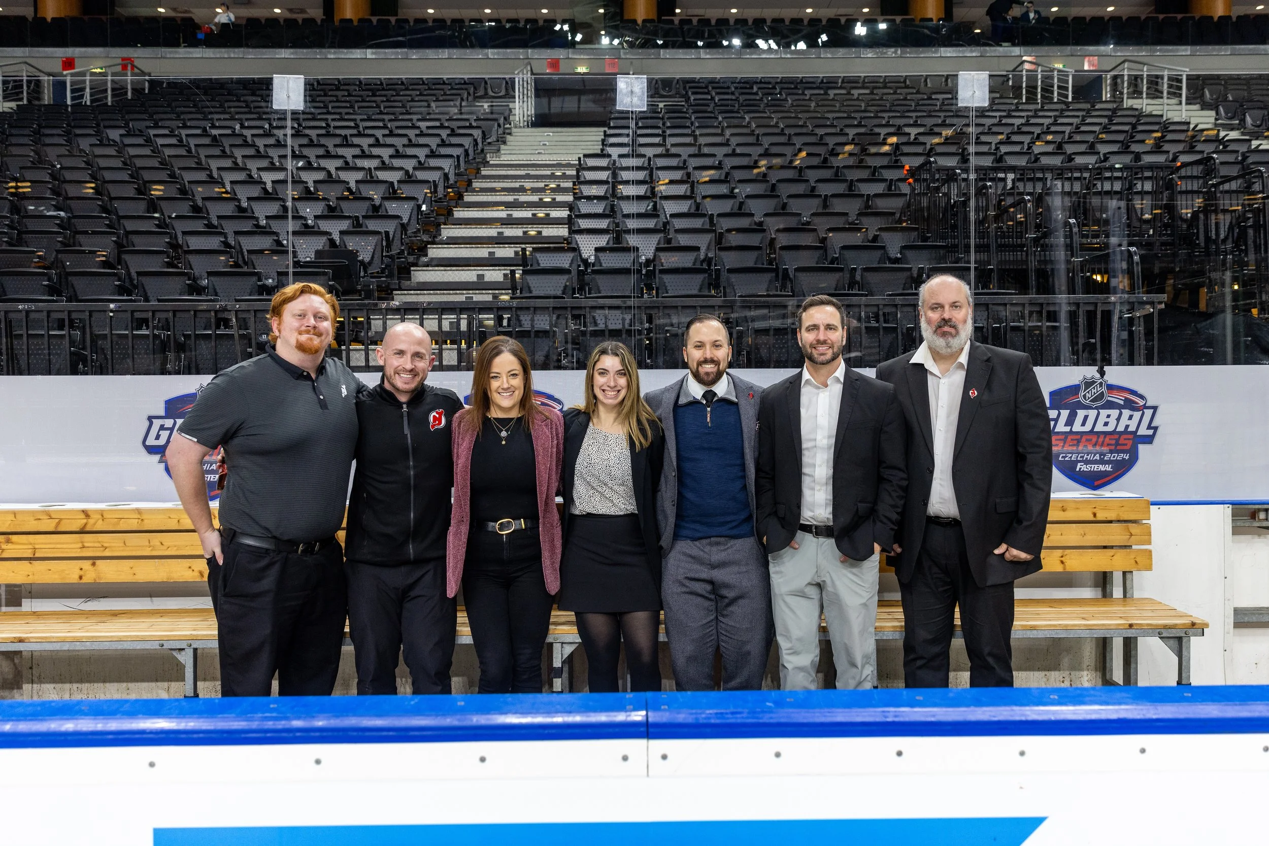 The NJ Devils team in a hockey rink in Czechia