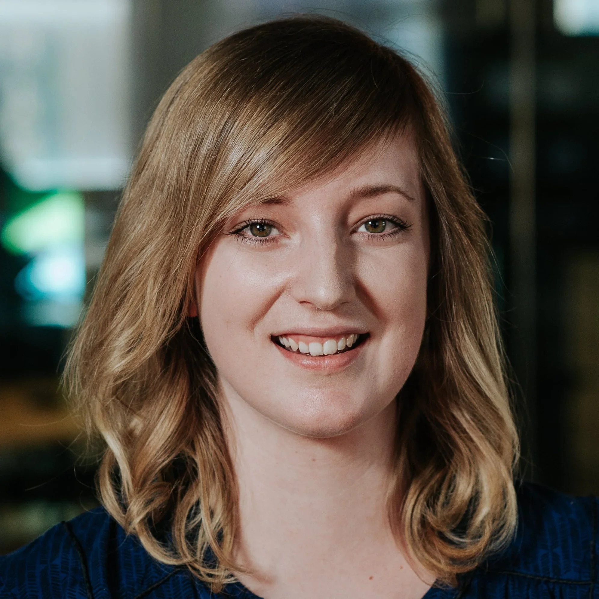 A headshot photo of Areto's Head of Product, Lauren Briske