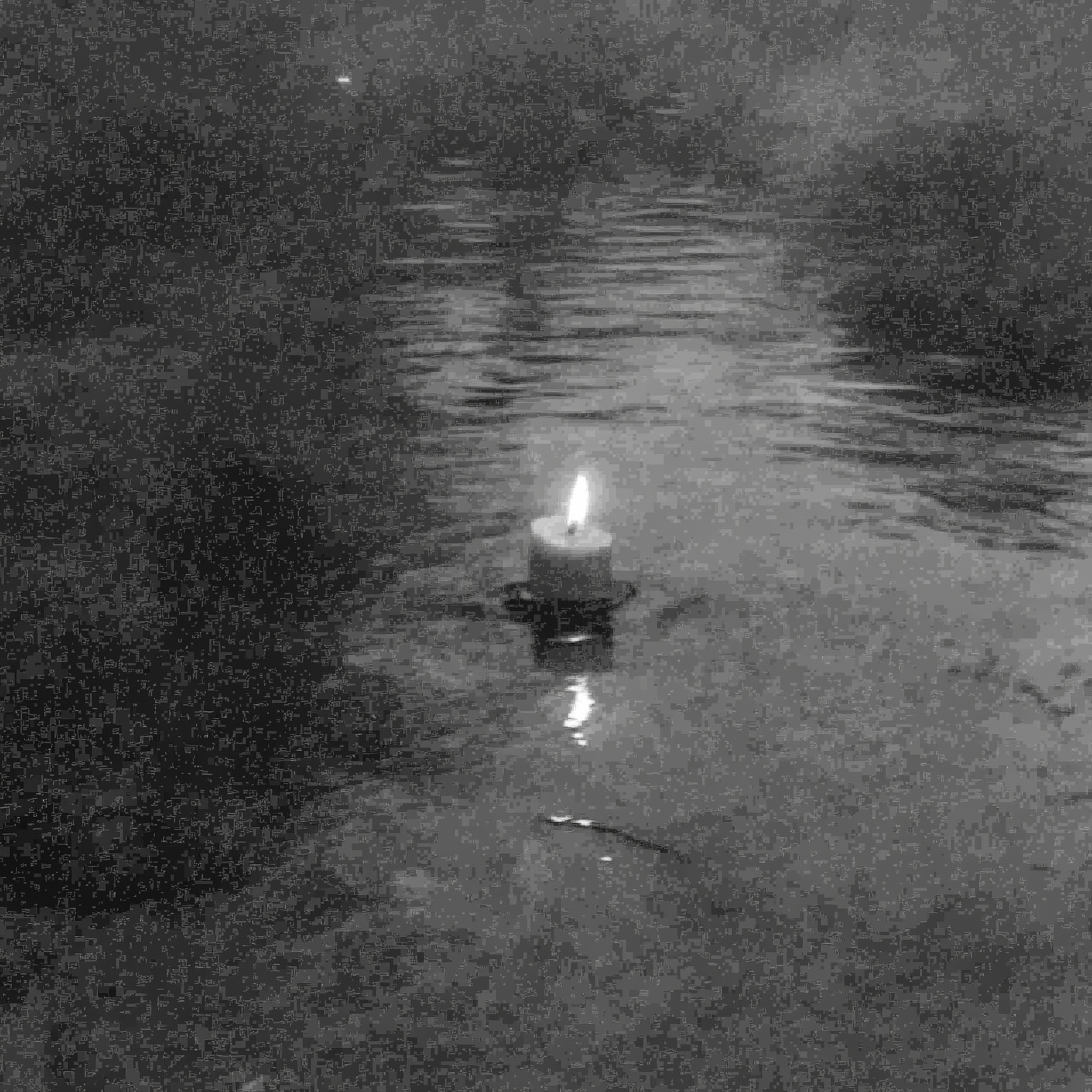 caroavocado_black_and_white_vintage_photo_of_a_candle_on_the_wa_2f1291e4-b4f0-4b6f-aa72-e330f8b713df (2).png