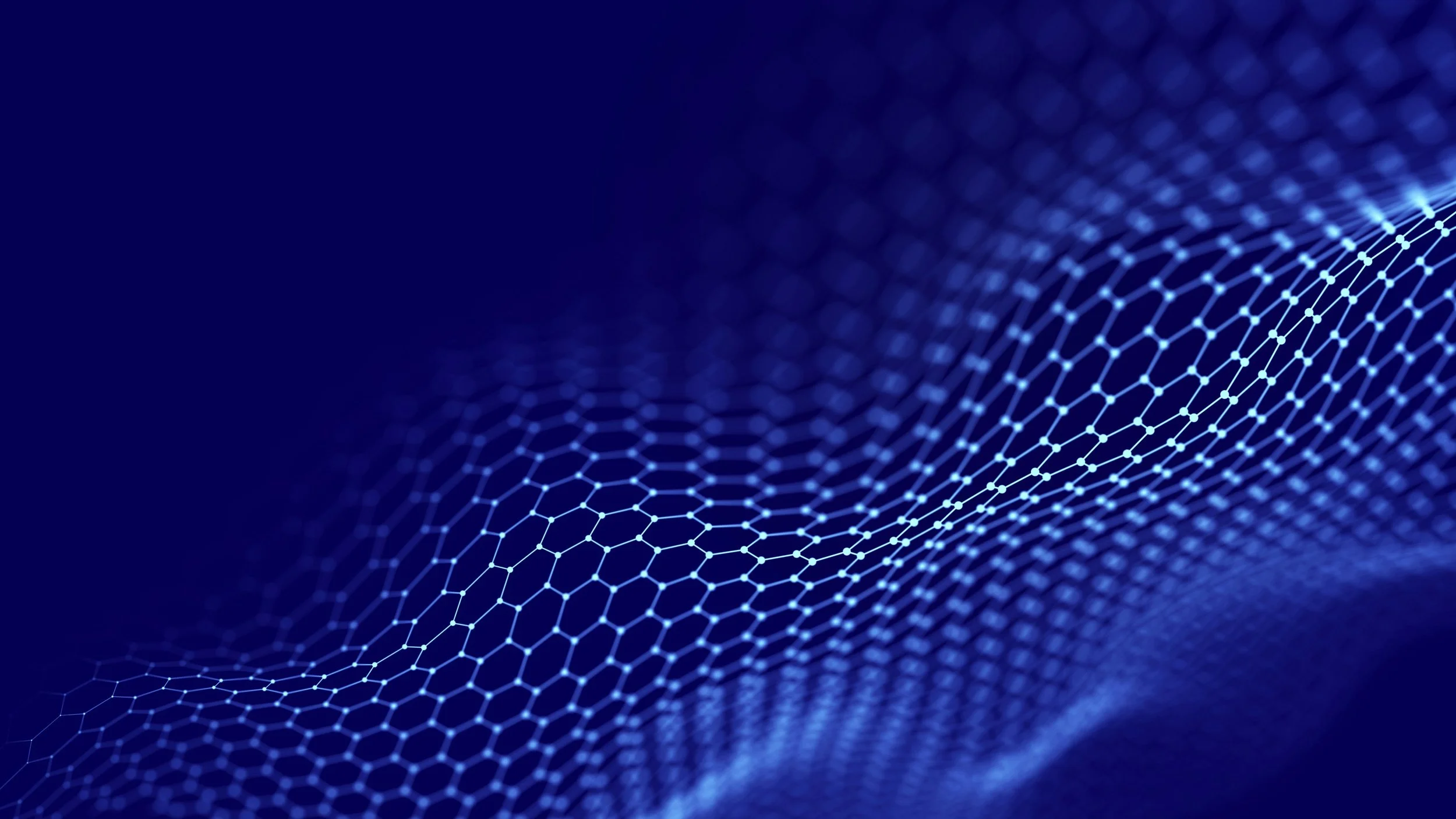 Digital abstract of interconnected hexagonal nodes forming a wave pattern on a dark blue background.