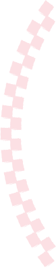 Close-up of a curved zipper with pink teeth and a black background.