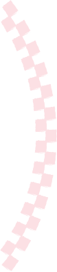 Close-up of a black and pink bicycle chain with alternating color links.
