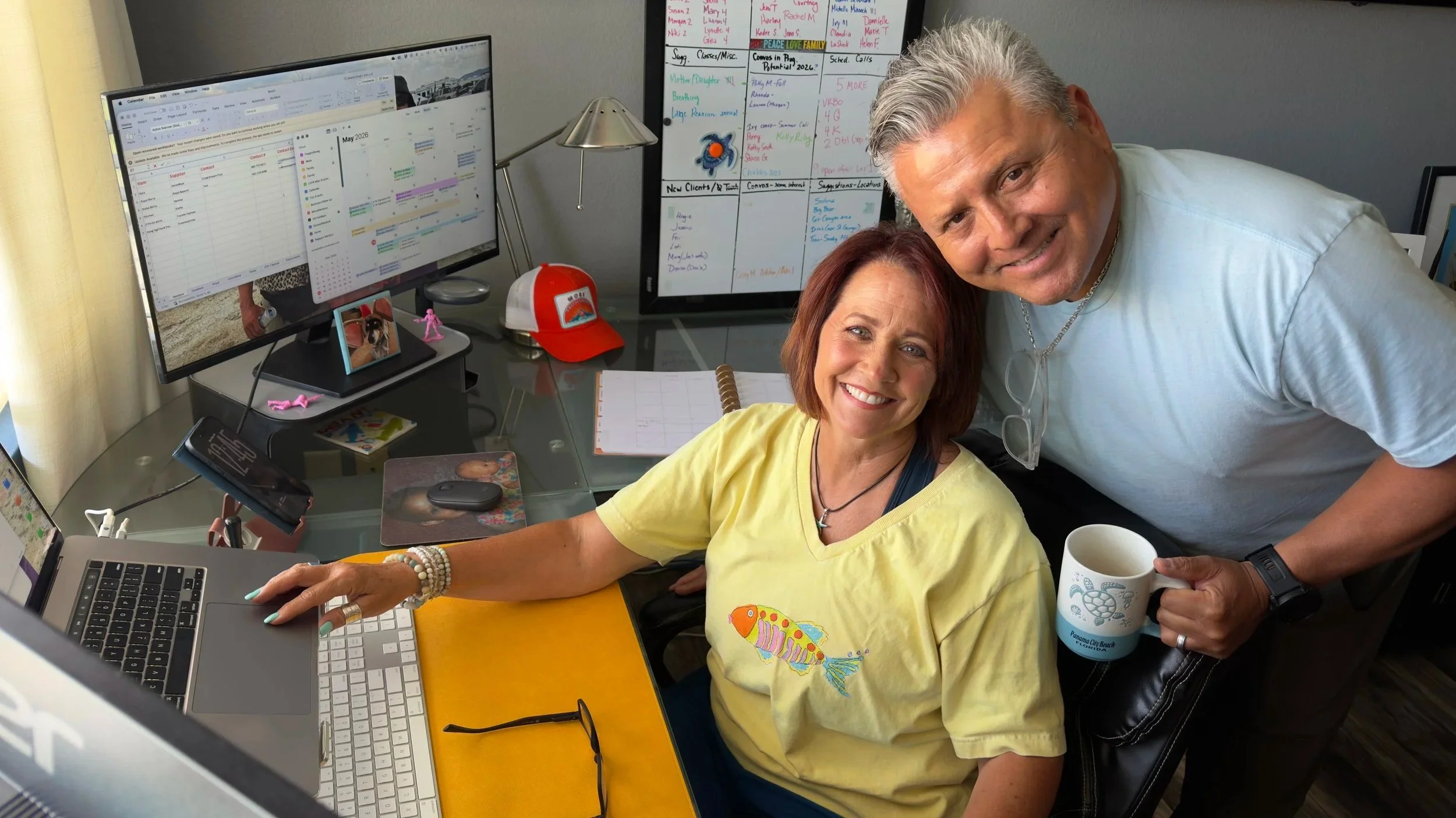 Image of a woman and man at a computer workstation