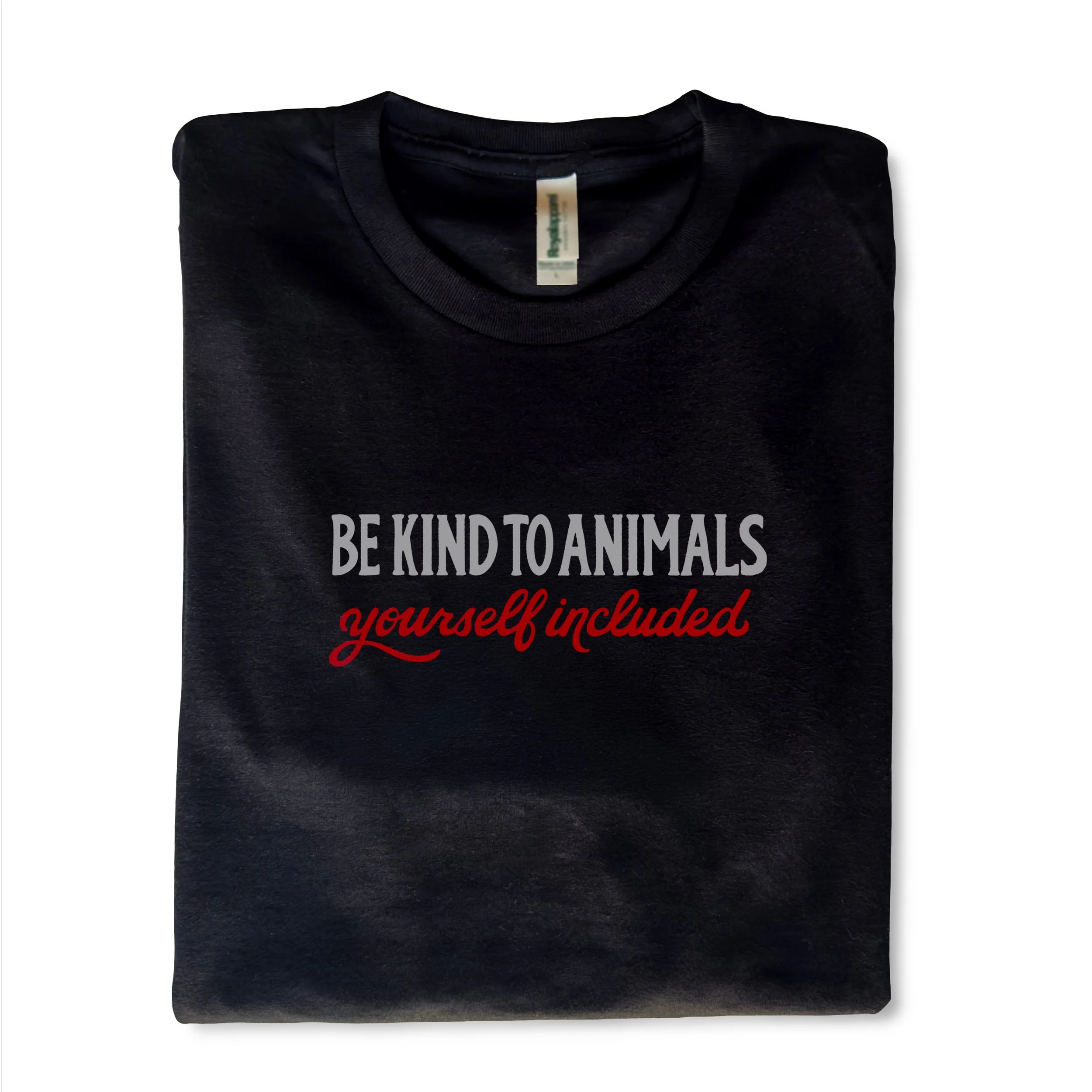 Image of a black t-shirt with a "Be kind to animals, yourself included" message