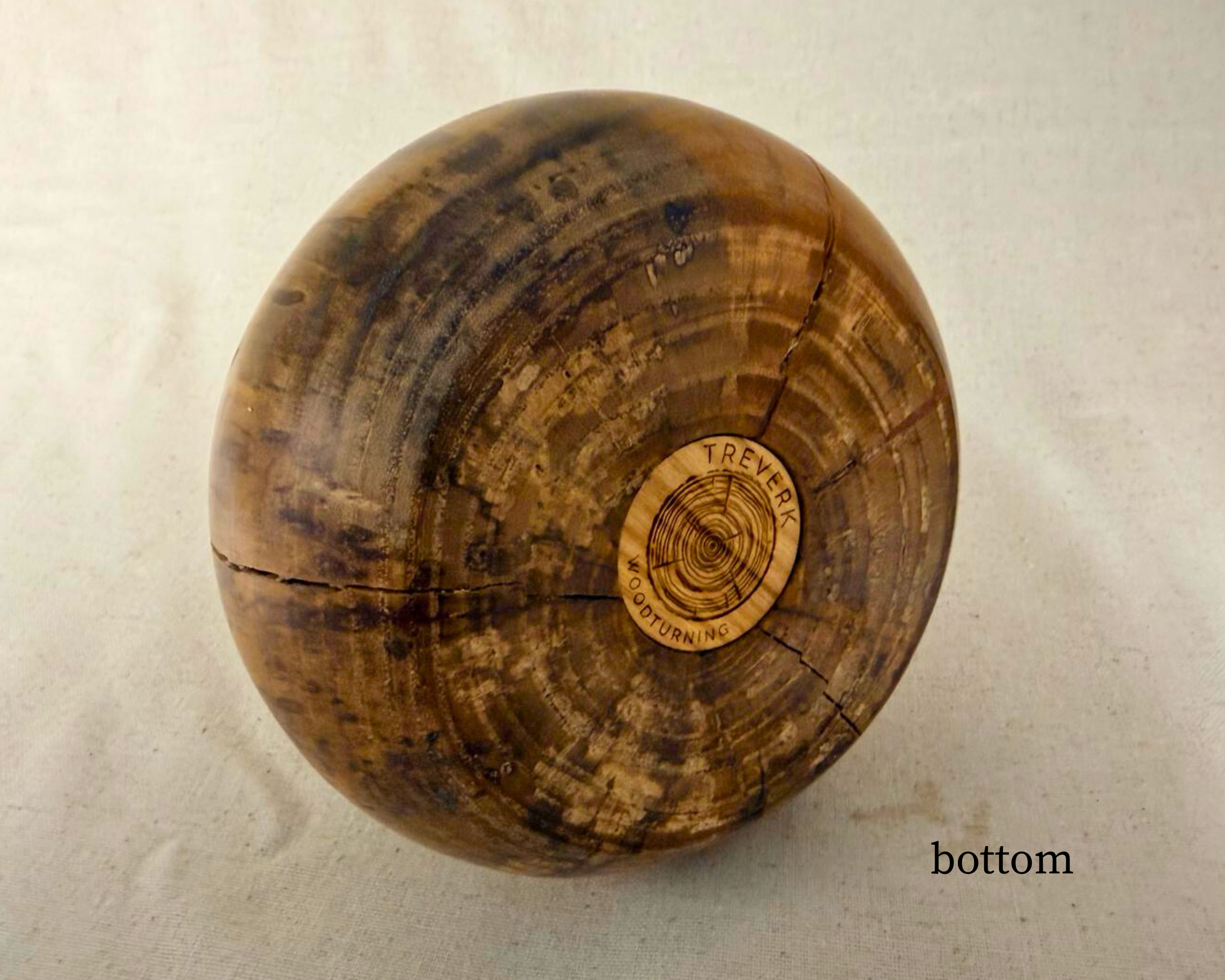 Bottom view of reclaimed maple vase showing turned base and Treverk Woodturning maker’s mark.