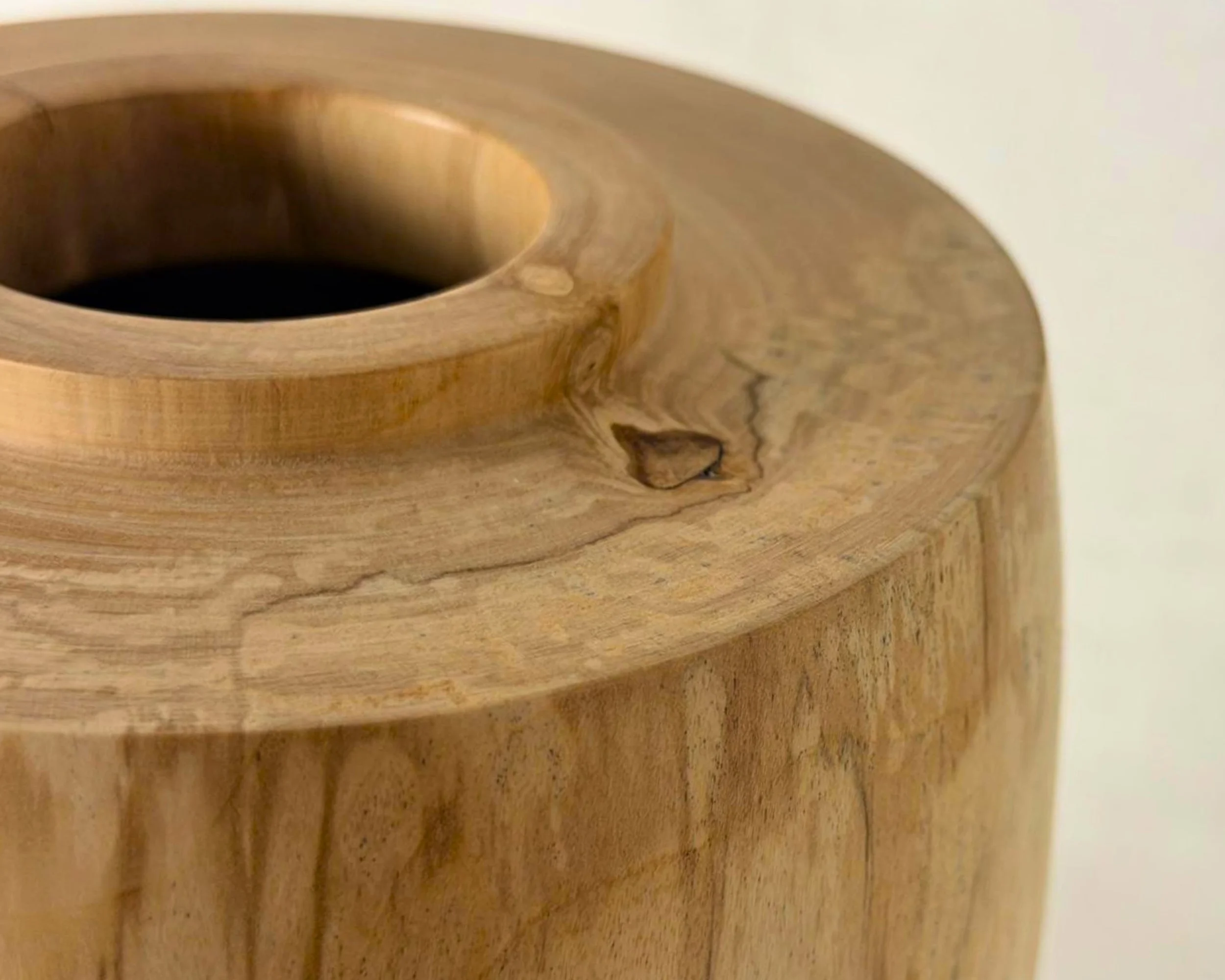 Detail of spalted river birch grain near the rim, showing swirling figure, fine spalt lines, and natural variation.