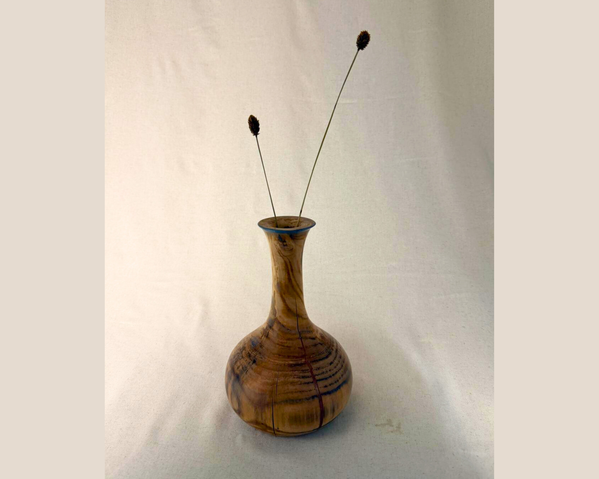 Reclaimed maple vase styled with dried stems, highlighting tall form and narrow 1-inch opening.