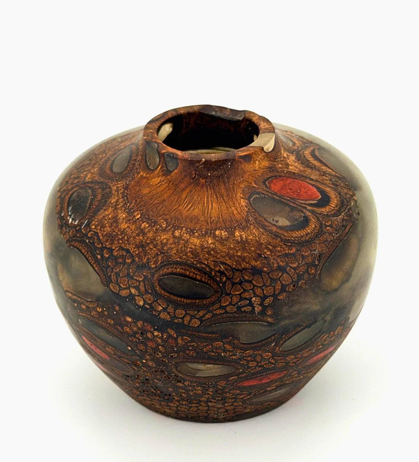 Decorative hand-turned wood and epoxy accent vase with intricate brown, black, and red patterns on a white background.