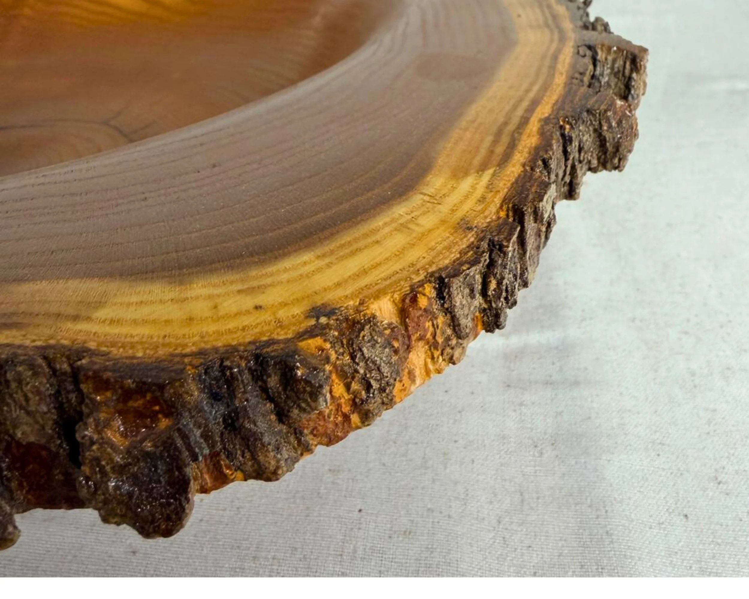 Close-up of mulberry live-edge bowl live edge bark.