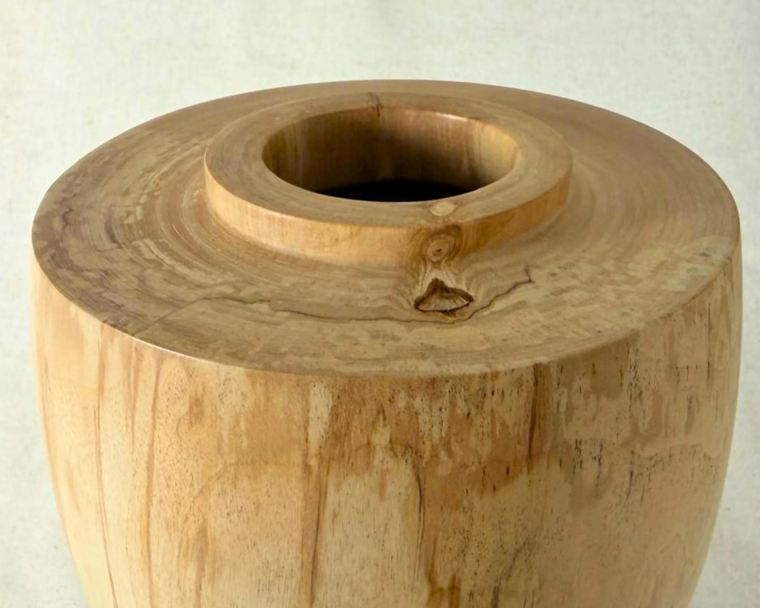 Close view of the vessel rim and opening in spalted river birch, showing subtle spalting and a small natural void.
