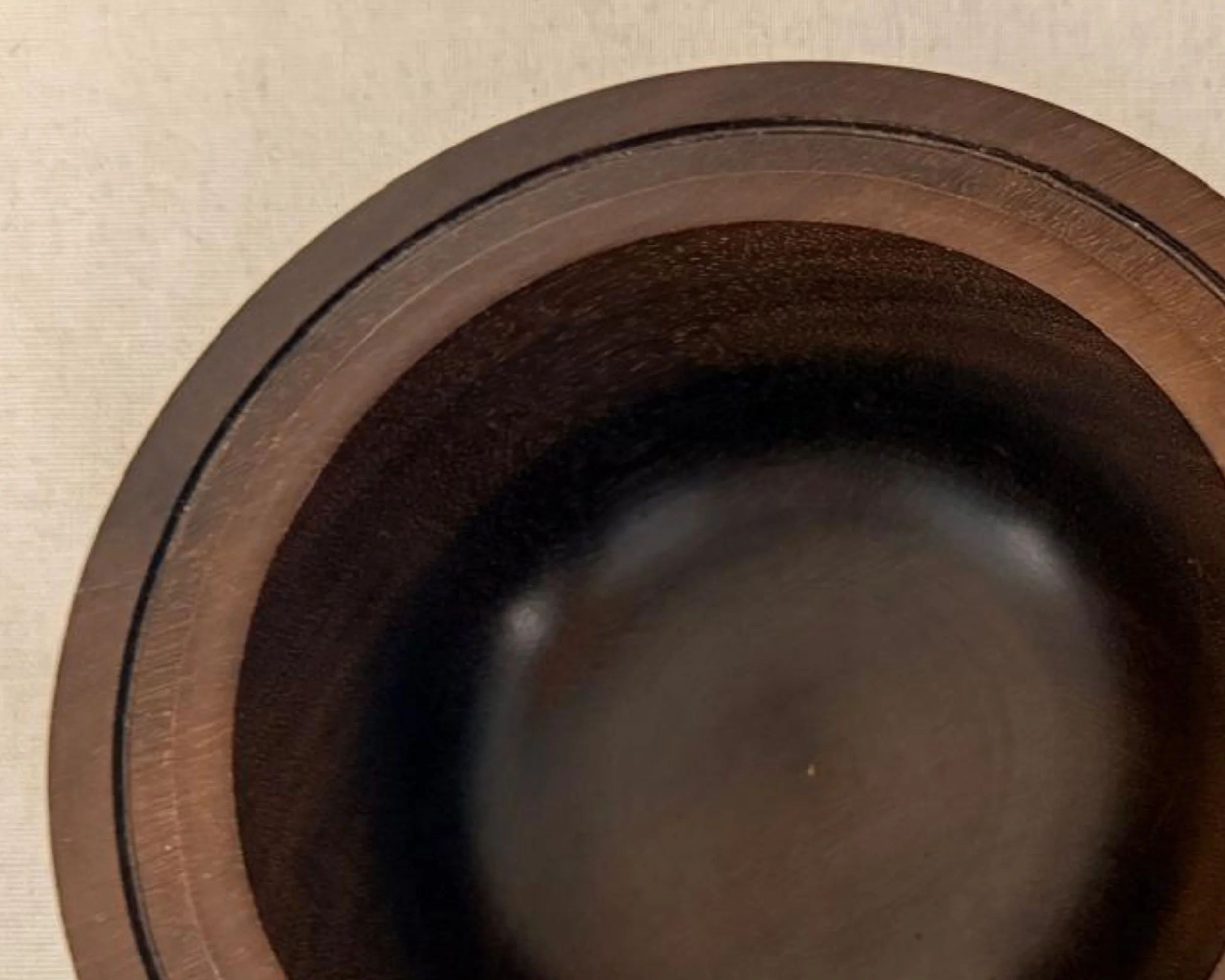 Top view of rosewood bowl highlighting wide rim geometry and recessed 4 inch opening.