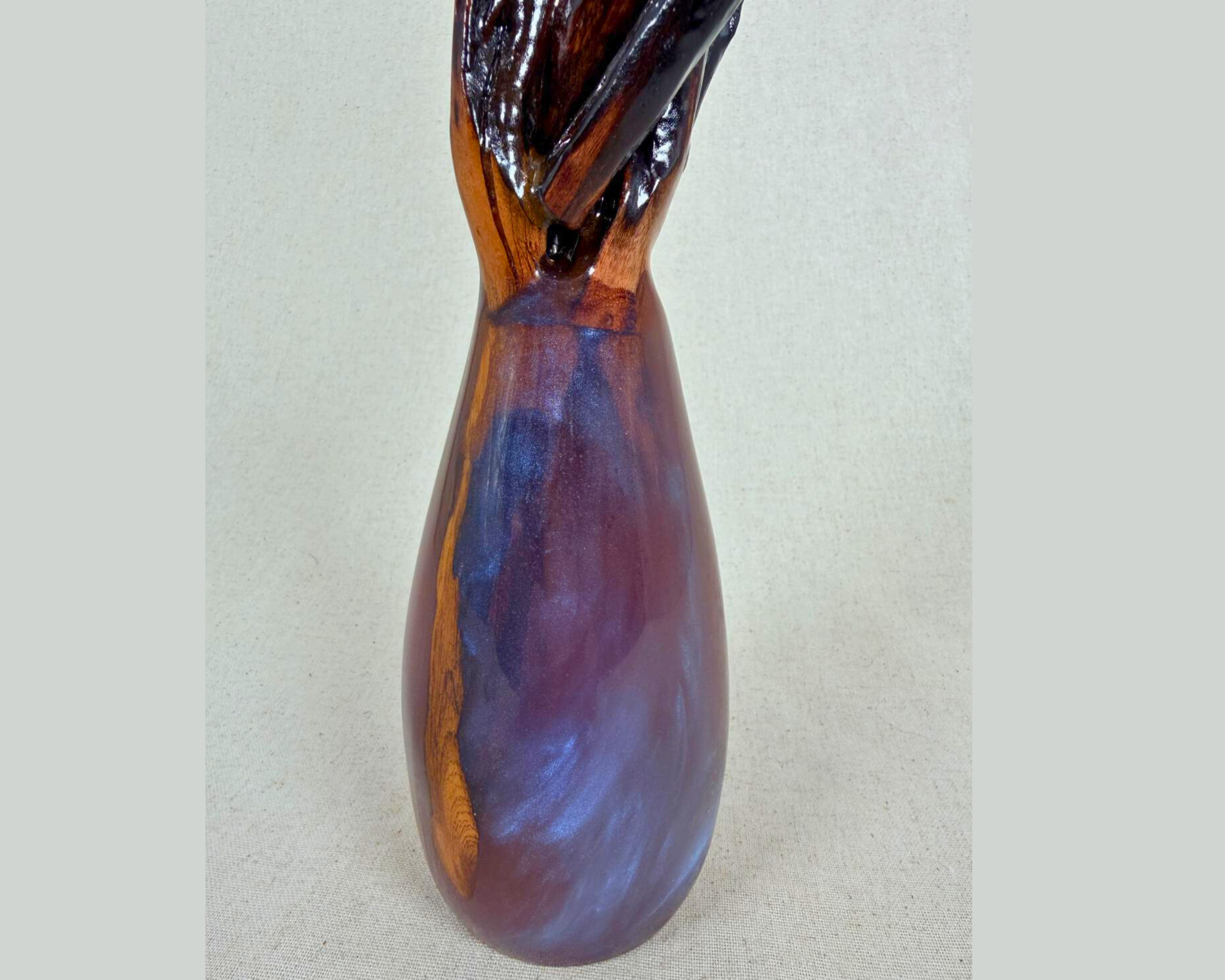 Full view of the driftwood and epoxy sculpture, with a tall branching driftwood top and elongated epoxy base.