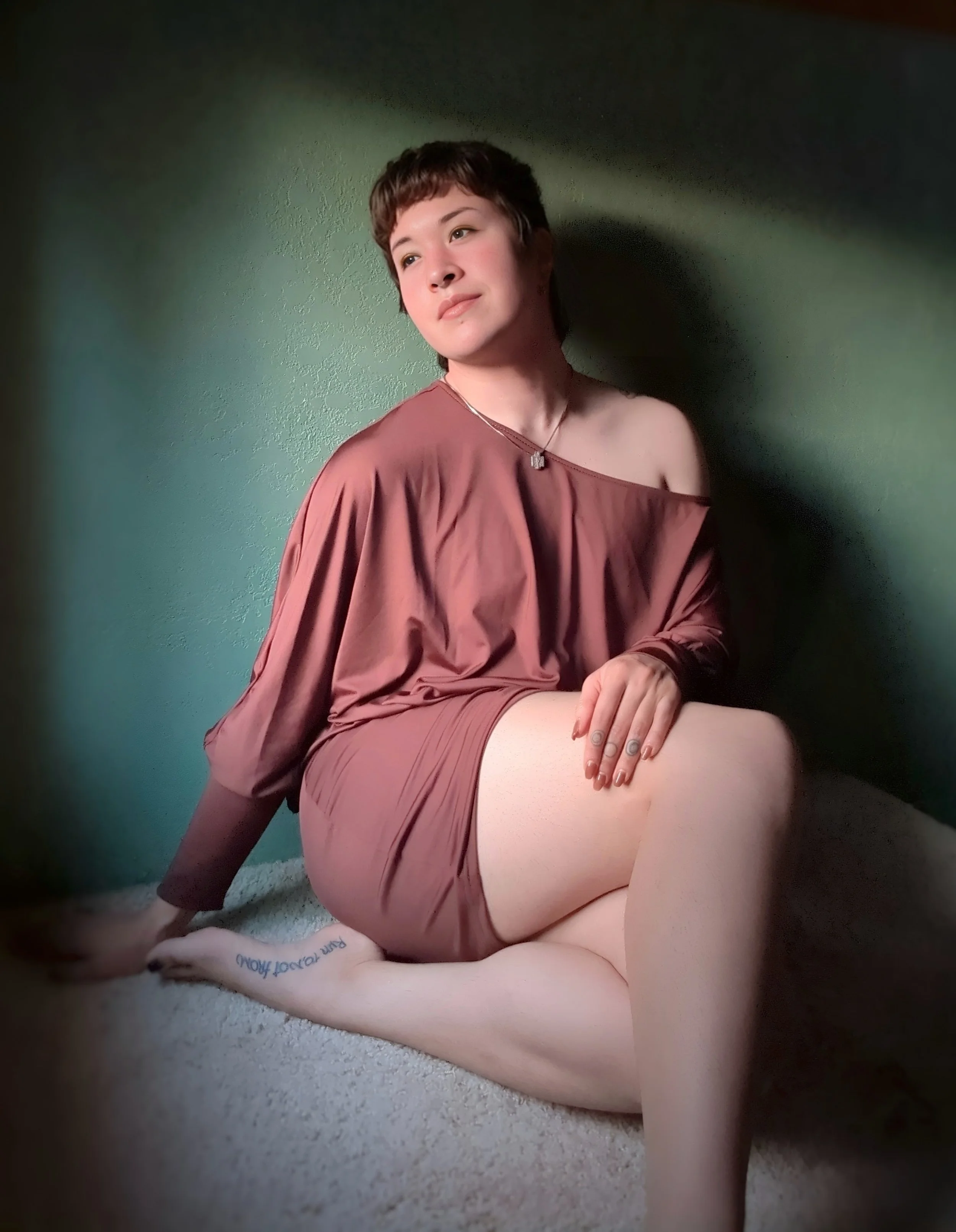 Cozy portrait of Thorne Vo reclining near the window.