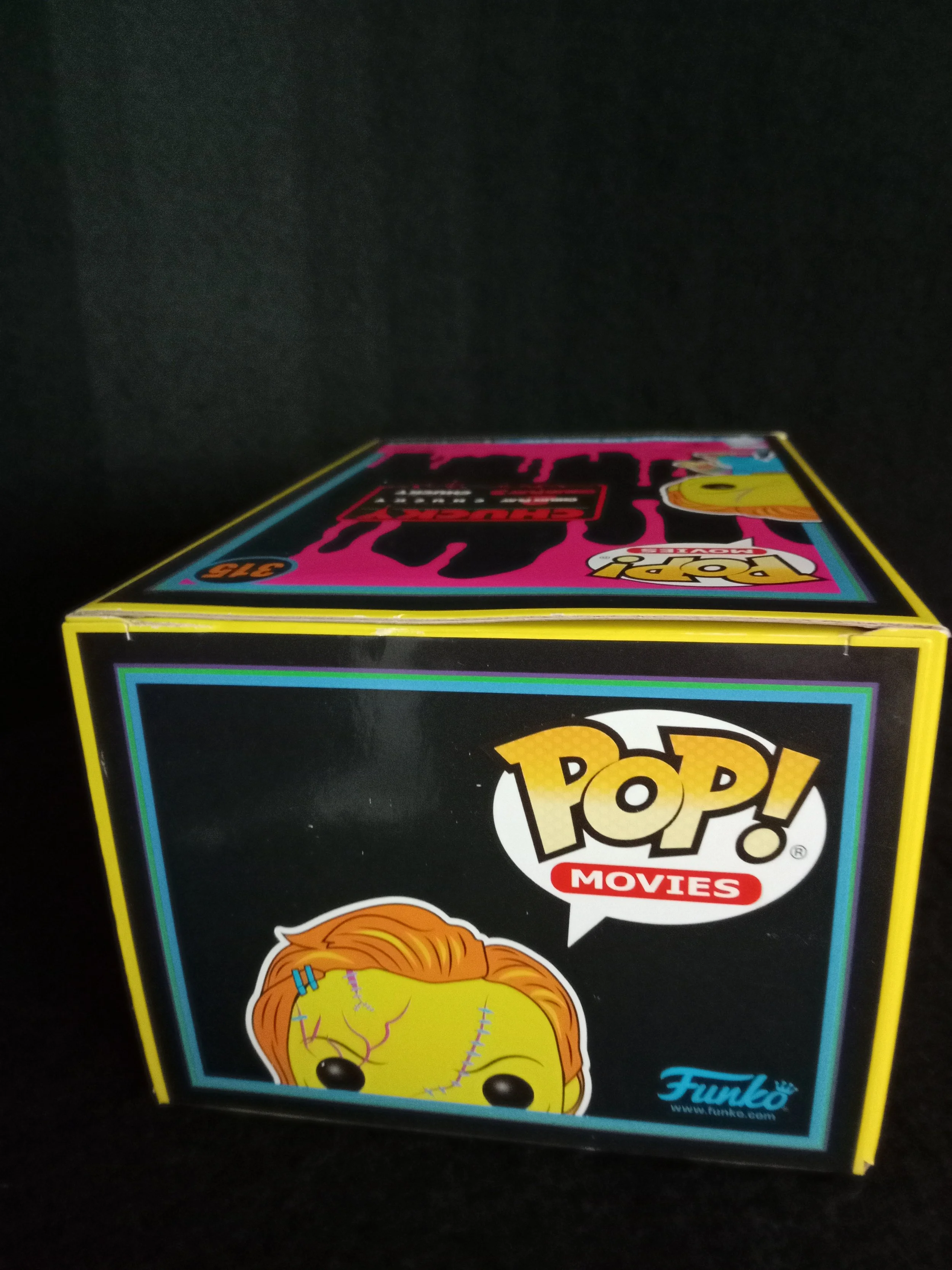 Chucky 315 - Blacklight - 5 - Funko Pop!.jpg