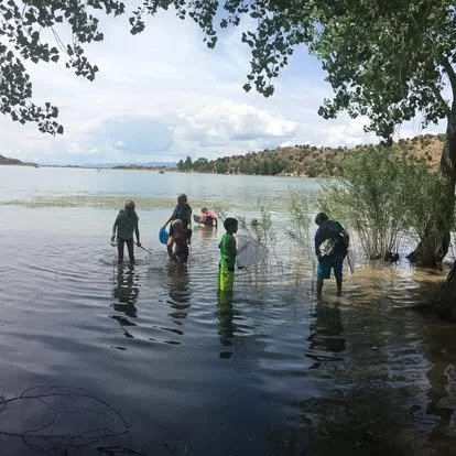 A family enjoying a day at the lake near Manti, Utah, illustrating the rural Utah lifestyle at Manti Temple View Estates.