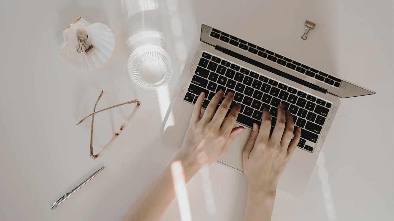 Woman's hands on laptop