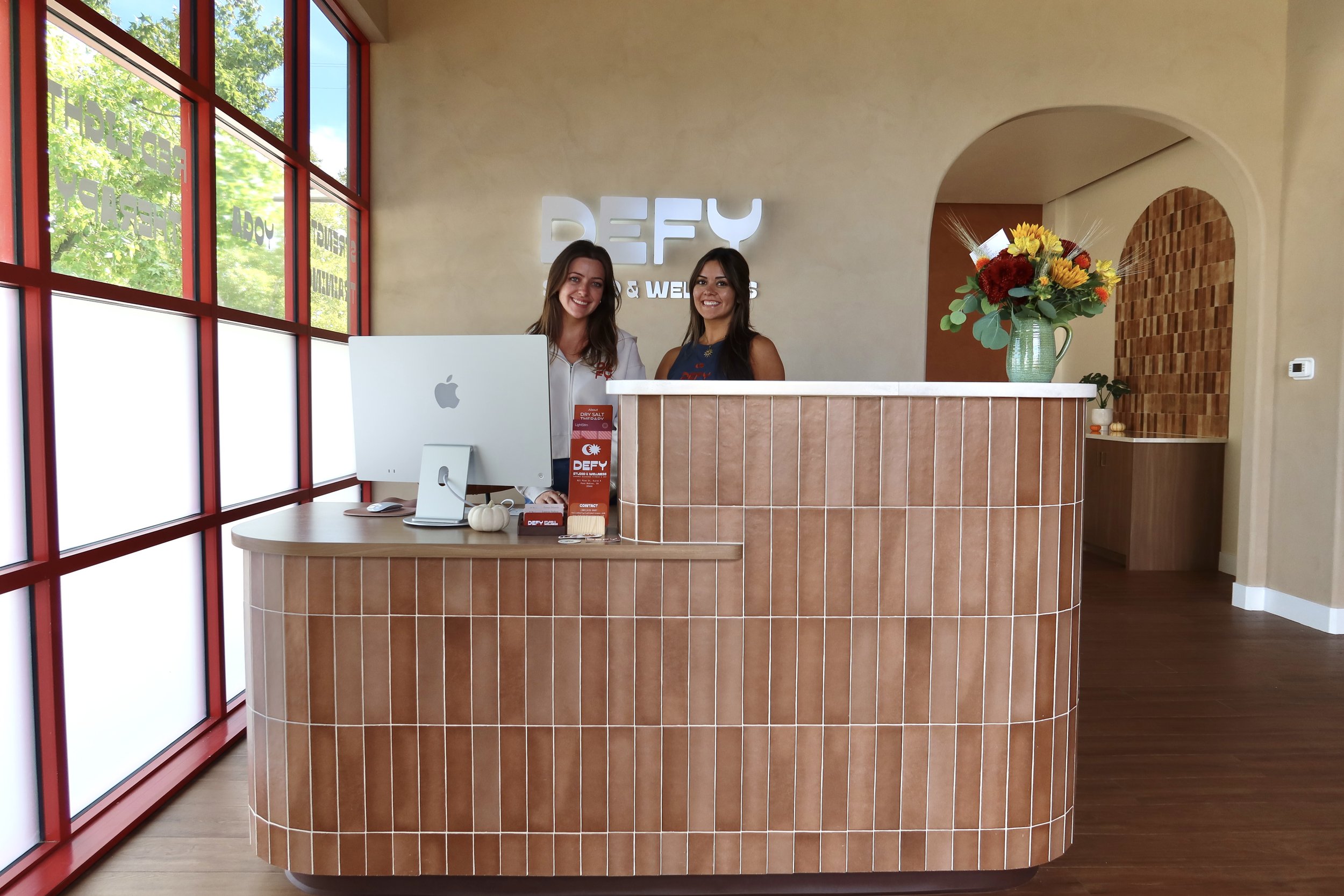 Reception desk at DEFY Studio & Wellness in Paso Robles, California.