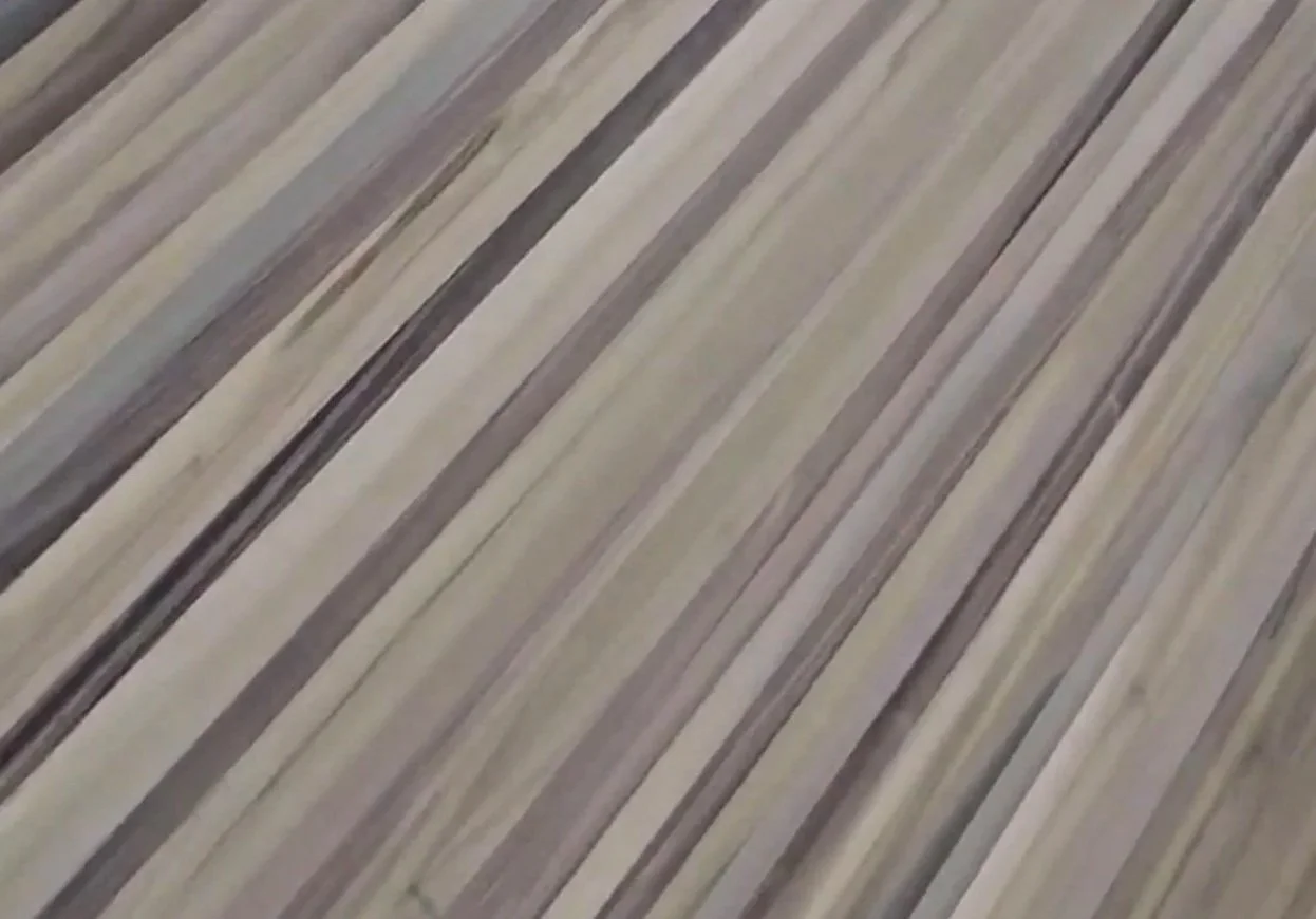 Close-up of wooden planks arranged diagonally.