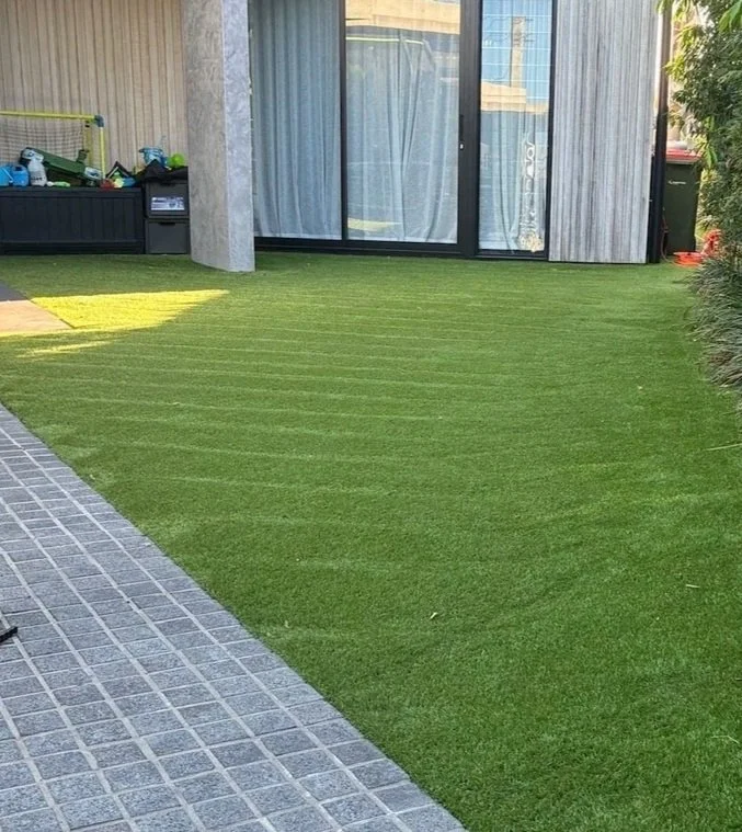 Artificial grass lawn installed in a Sunshine Coast backyard