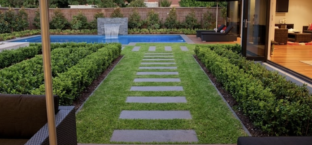 Artificial grass laid around a swimming pool on the Sunshine Coast
