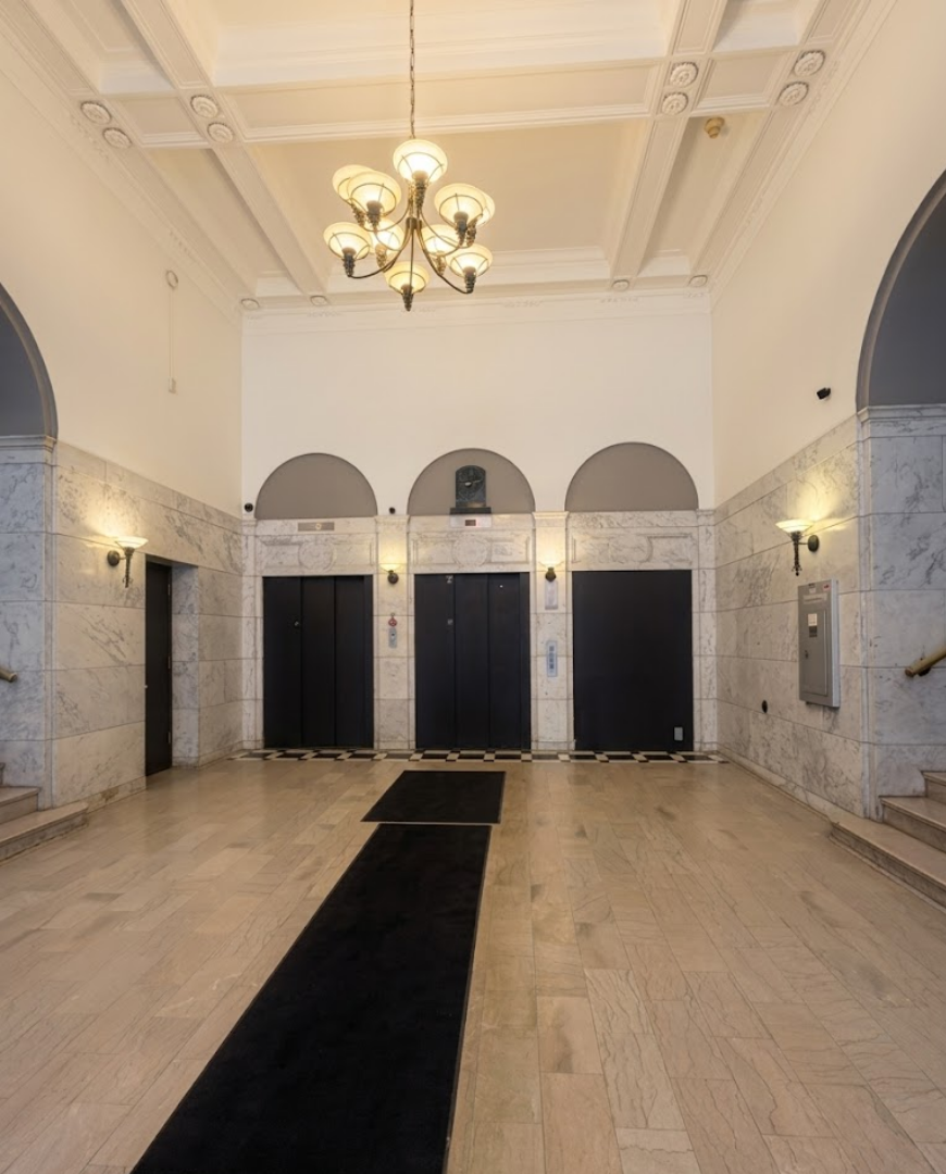 Main entrance to the downtown Saint Paul office building where Zap House is located, providing electrolysis hair removal and gender-affirming care services.