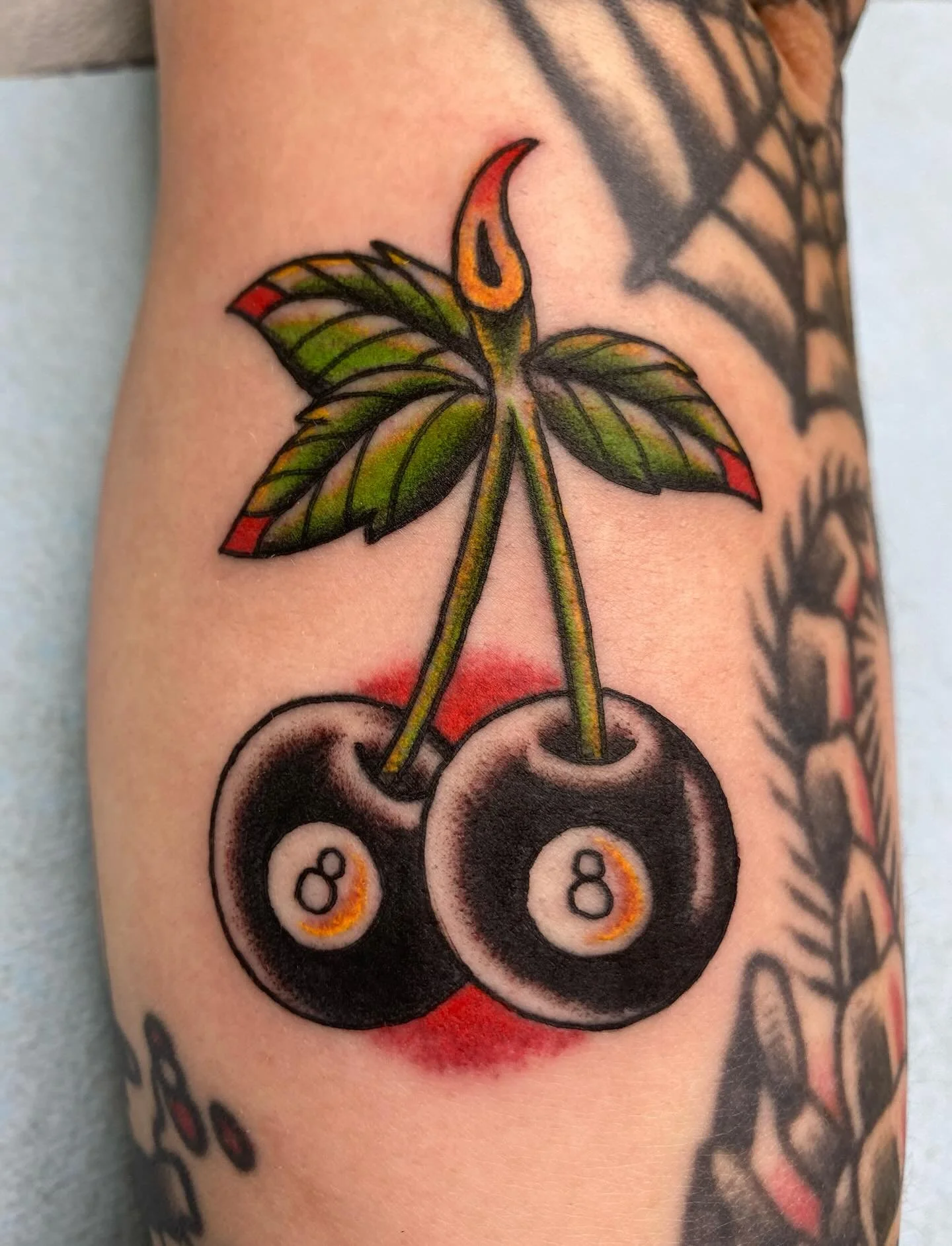 Drew these 8ball cherries for the Hi-Dive queen @shitbirdism thank you for coming in. @thickasthievestattoo #traditionaltattoos #denvertattooartist #tattoos #americantraditionaltattoo #love