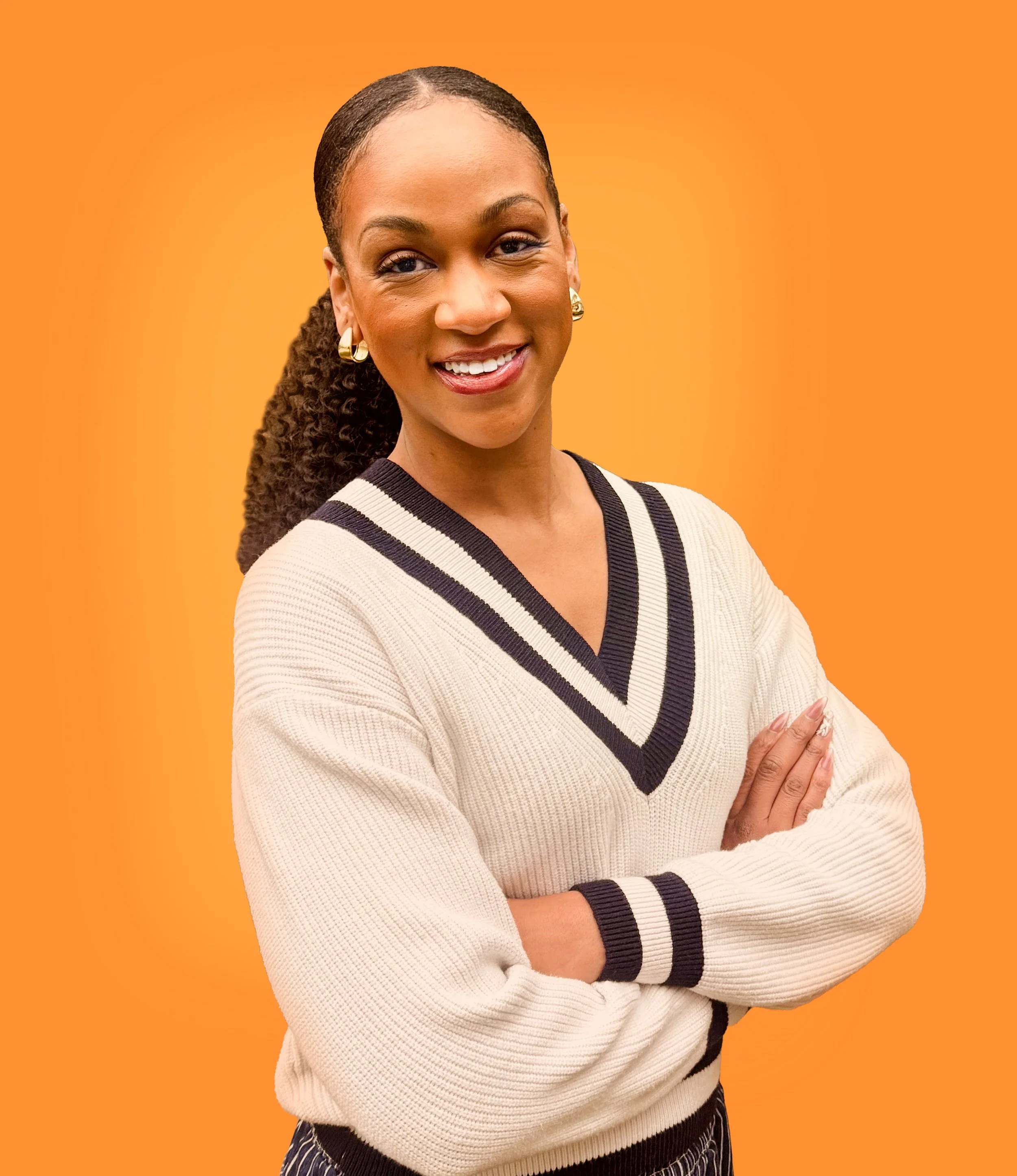 A photo of Michele Ross looking at the camera.