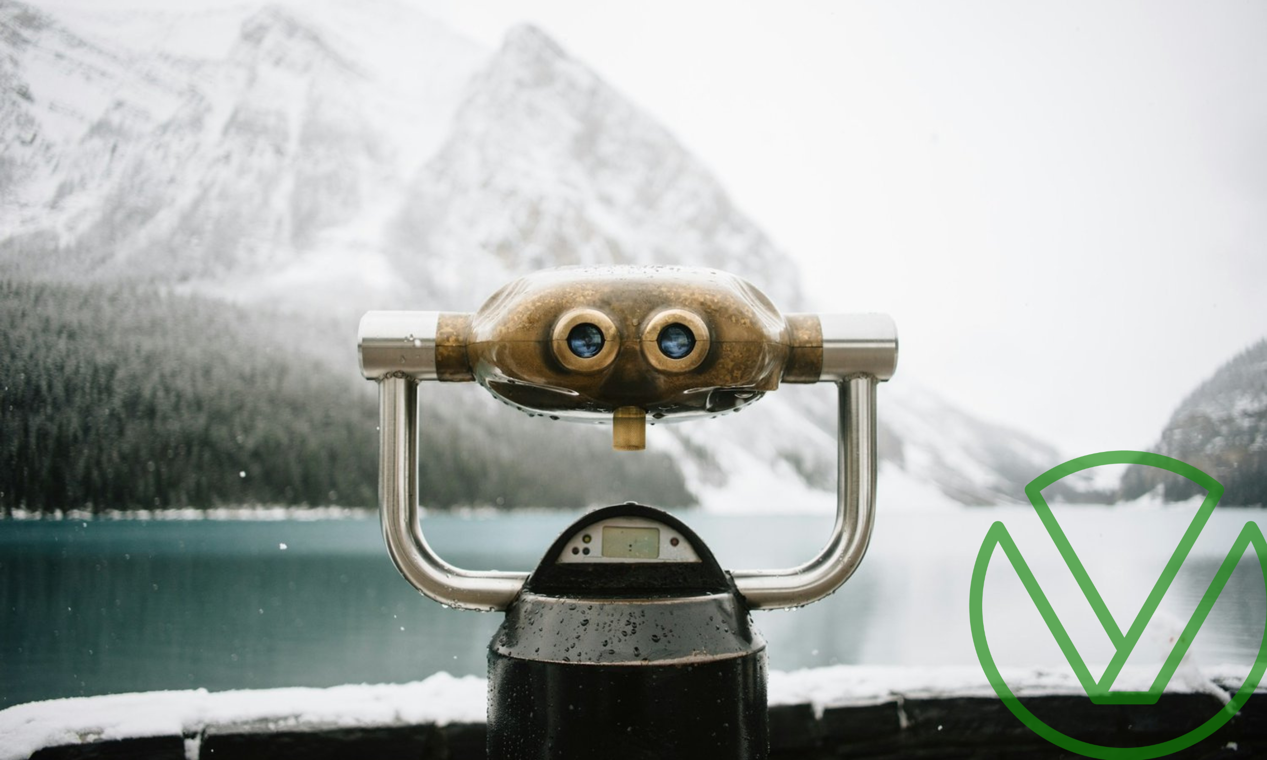 Binocular viewer overlooking a snowy mountain and lake, symbolizing clarity and oversight—relevant to the reinstated BOI reporting requirements and updated deadlines.