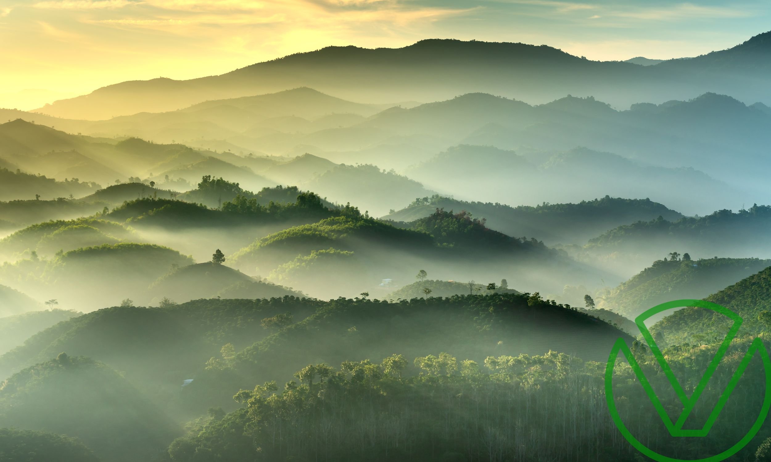 Serene sunrise over layered mountain ridges symbolizing clarity and foresight in proactive tax planning