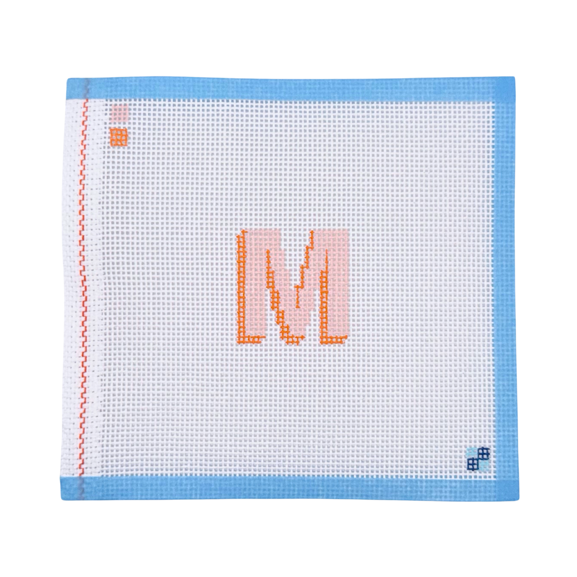 Hand-painted shadow letter M needlepoint canvas from McCain Collective.