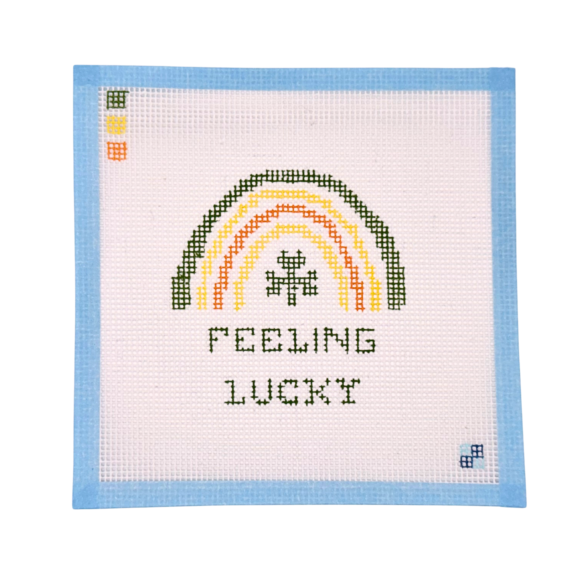 painted needlepoint canvas with a pink One Month Announcement on it