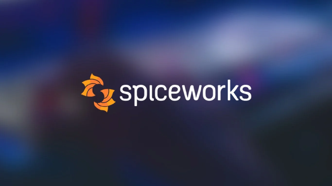 Spiceworks logo on top of blurred blue background