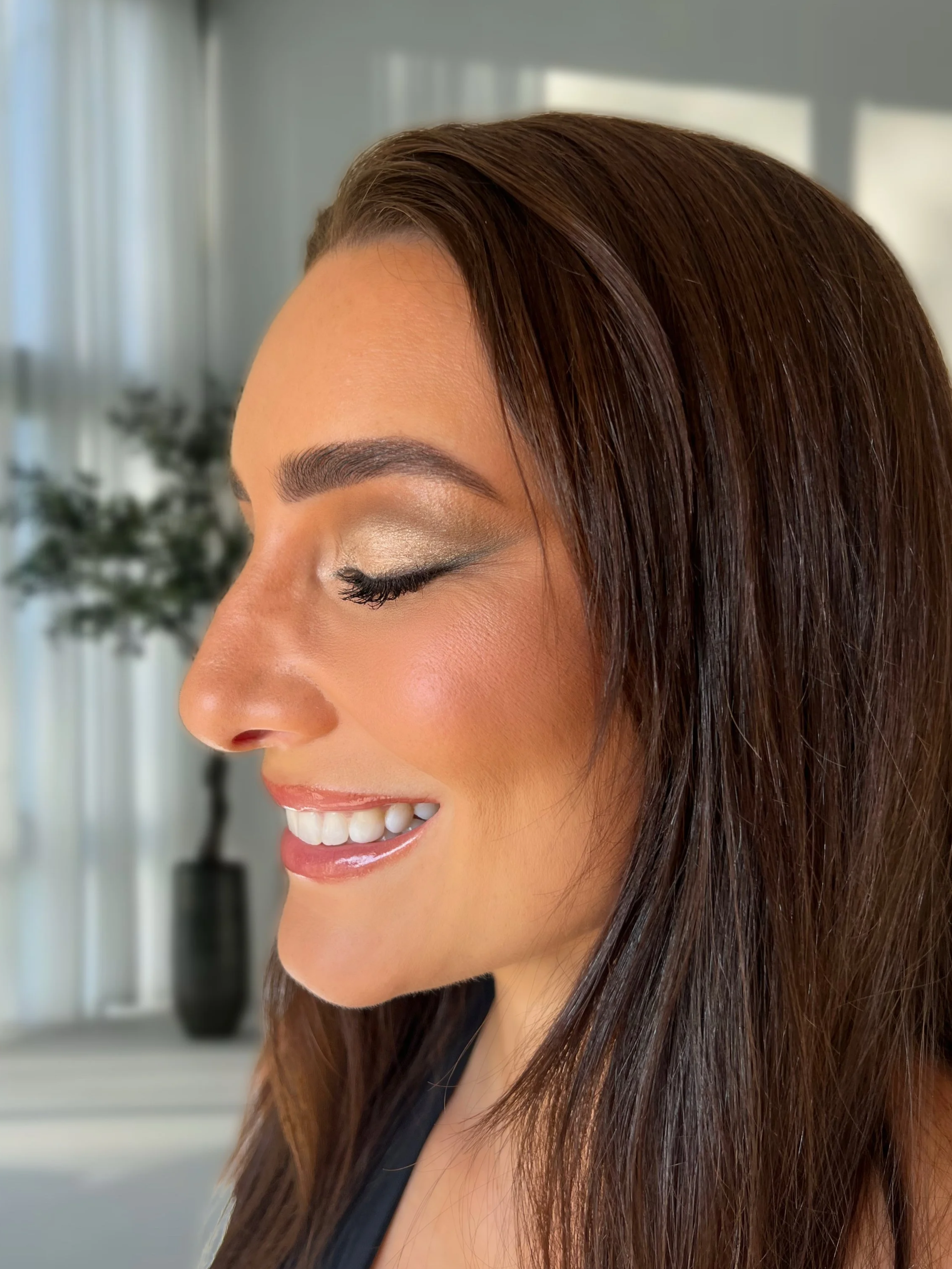 Sophisticated evening glam makeup created by Makeup by Anastasia for a Melbourne event that my client attended.