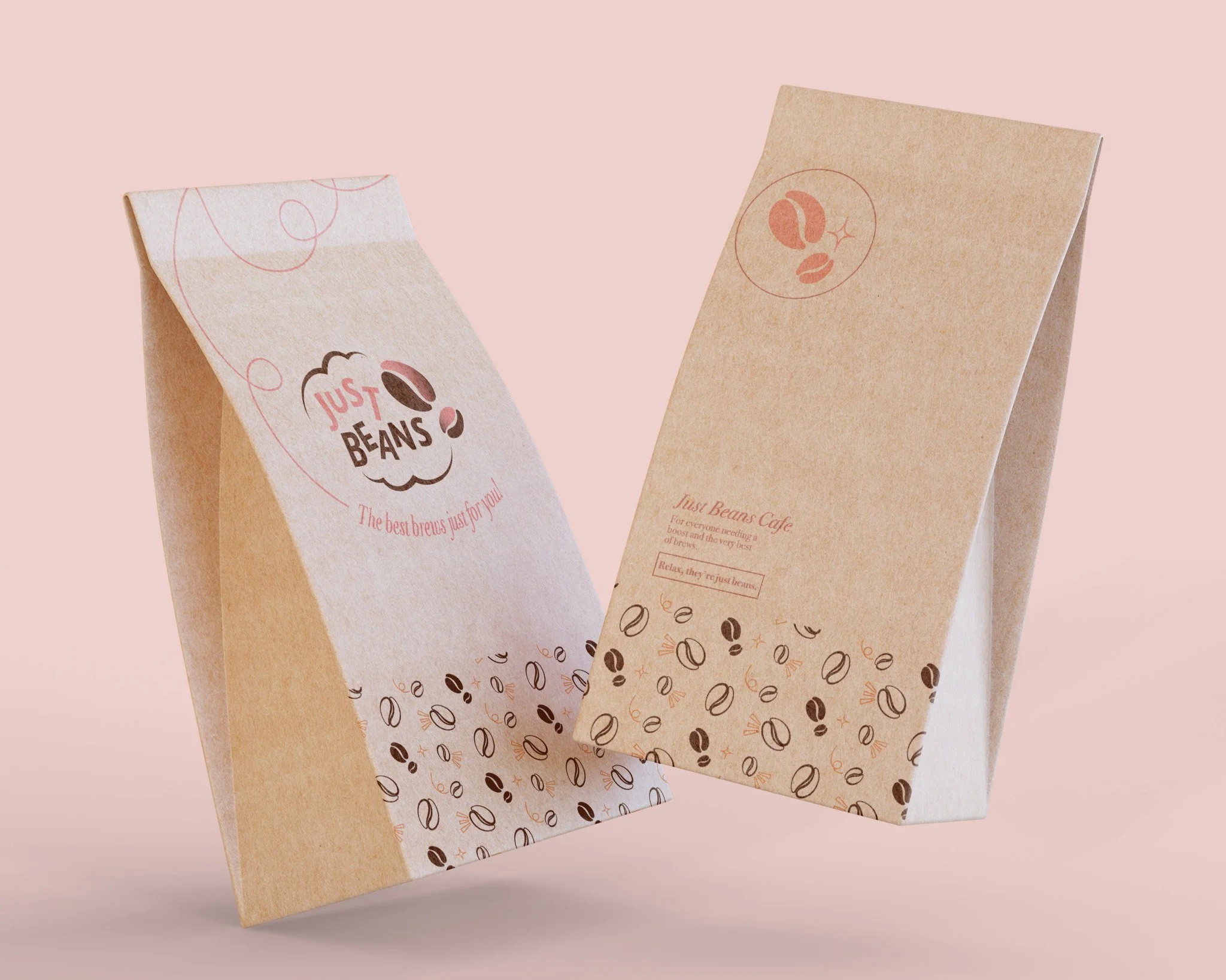 Two paper coffee bags with coffee bean designs and branding, one branded "Just Beans" and the other "Just Beans Cafe," set against a light pink background.