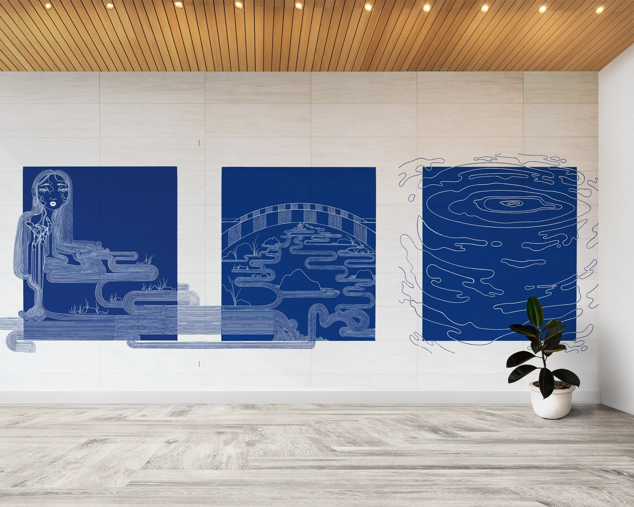 Three blue patterned artworks on a white wall, with a potted plant on the floor in front.