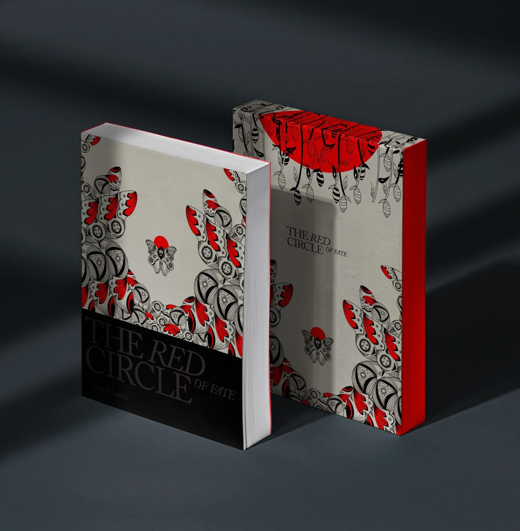Two books titled "The Red Circle of Fate" with decorative butterfly and floral cover designs, standing upright on a dark surface with subtle shadows.