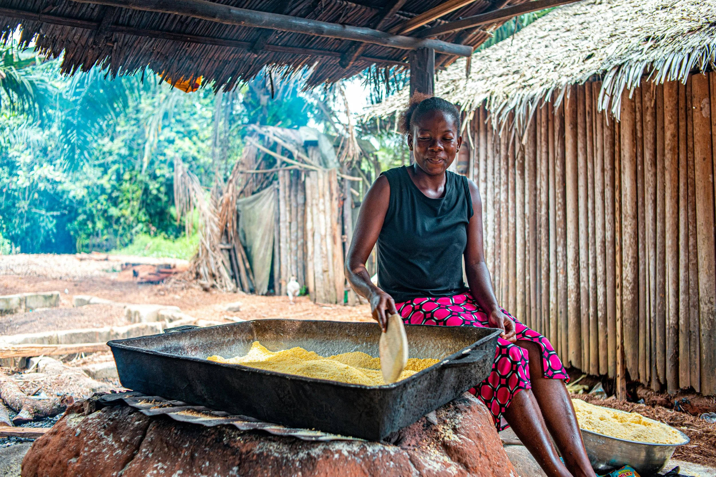woman making cornmeal