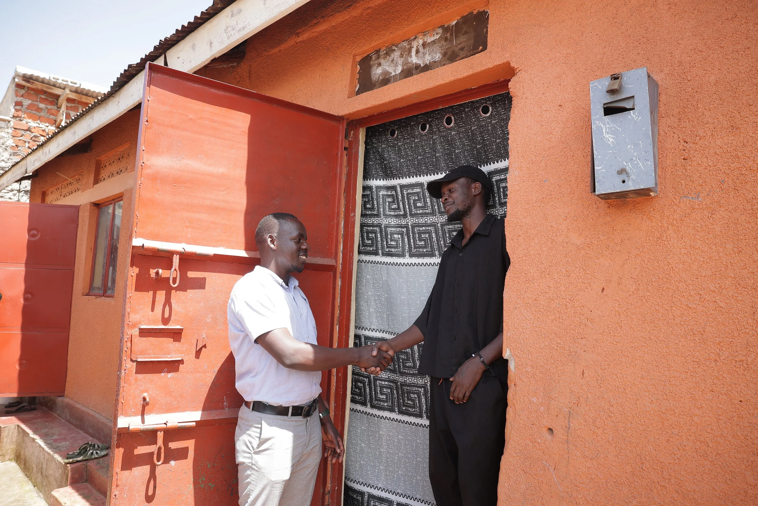 Documentary photograph for RentBeta showing flexible rent payments and housing access in Uganda, Africa