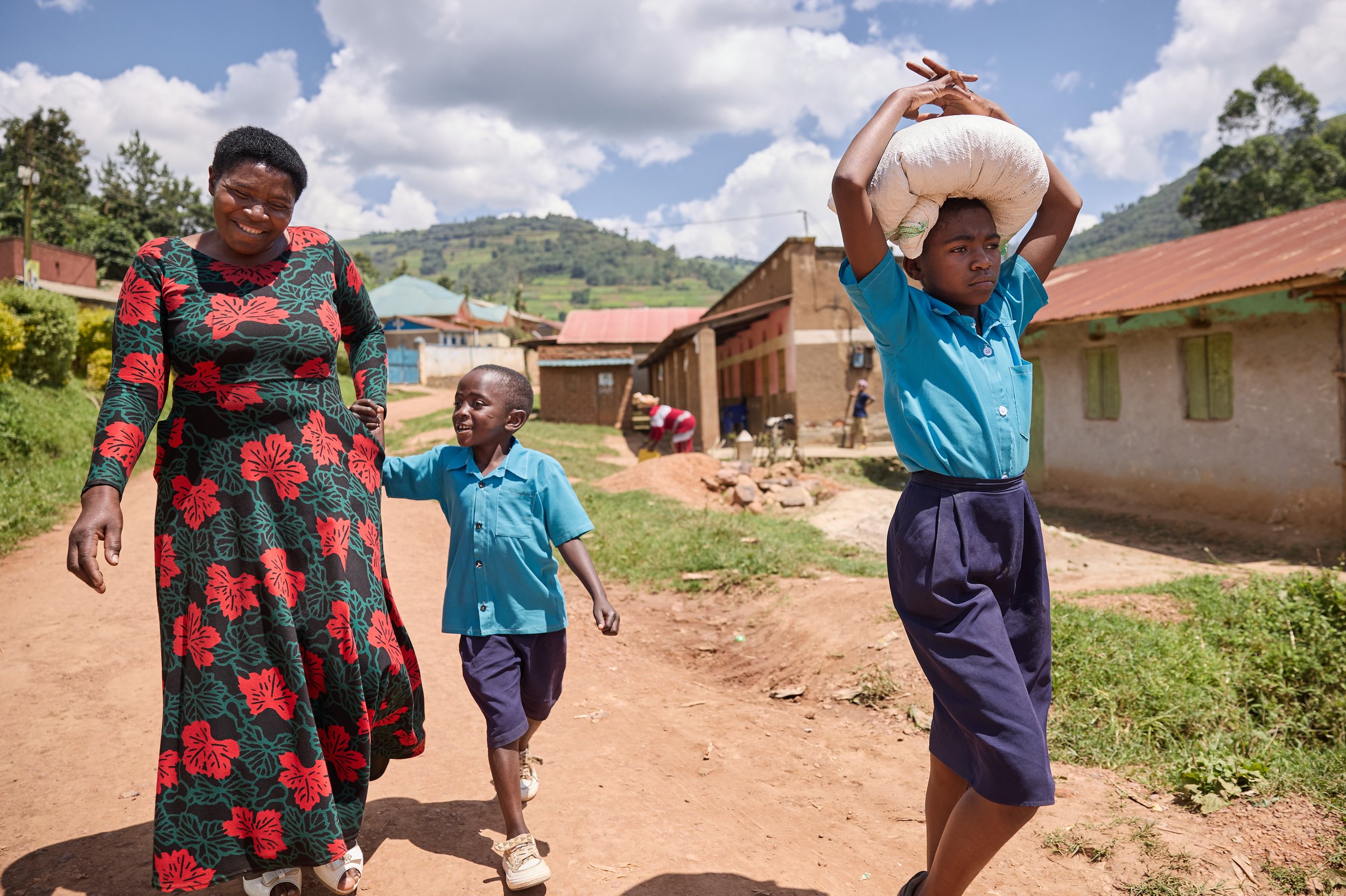 Documentary photograph for NUNU Fund showing smallholder farming, community trade, and financial inclusion in Uganda