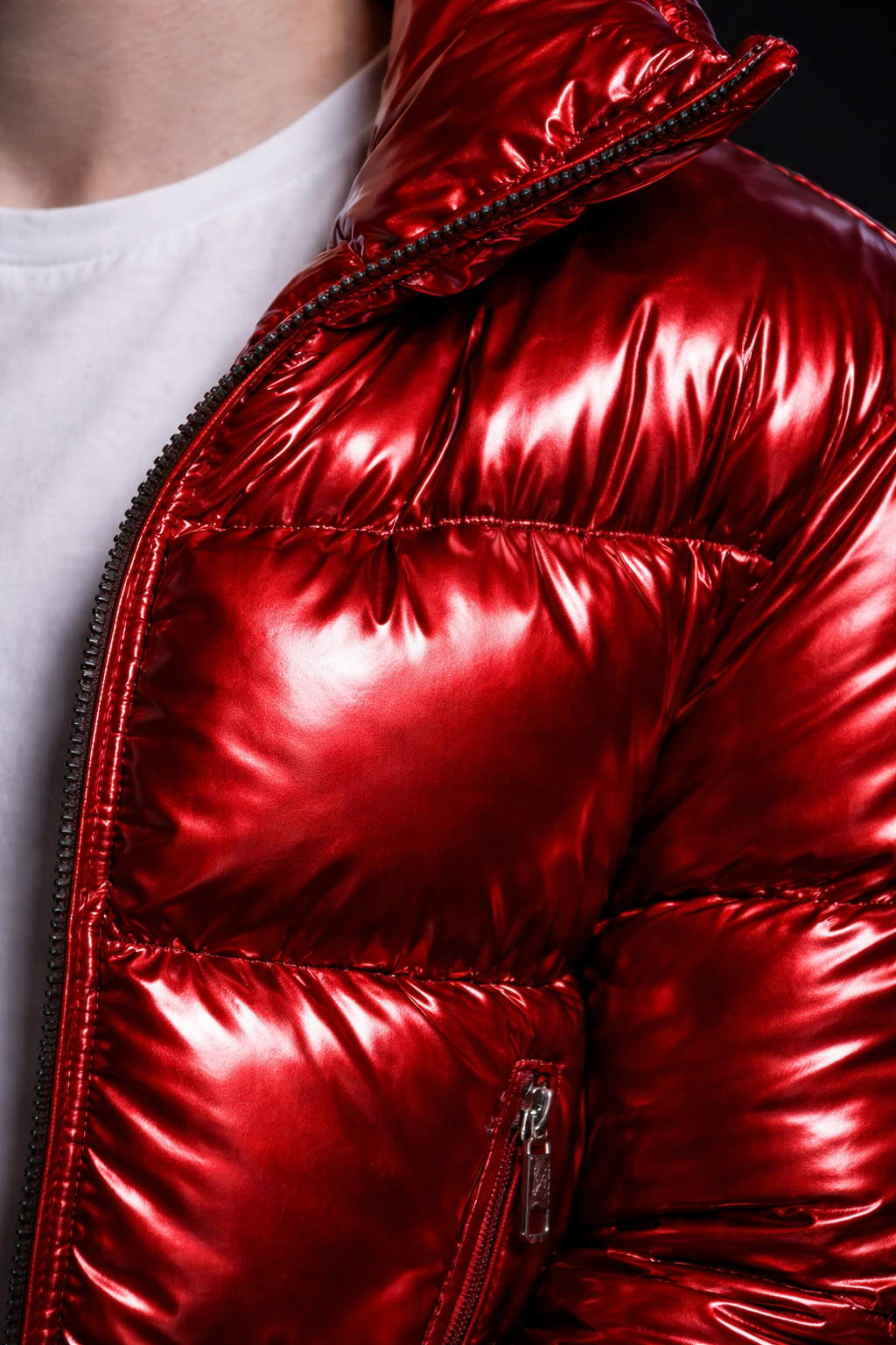 Close-up of a person wearing a shiny red puffer jacket with a visible zipper on the side. AI influencer, AI persona, AI design, custom AI.