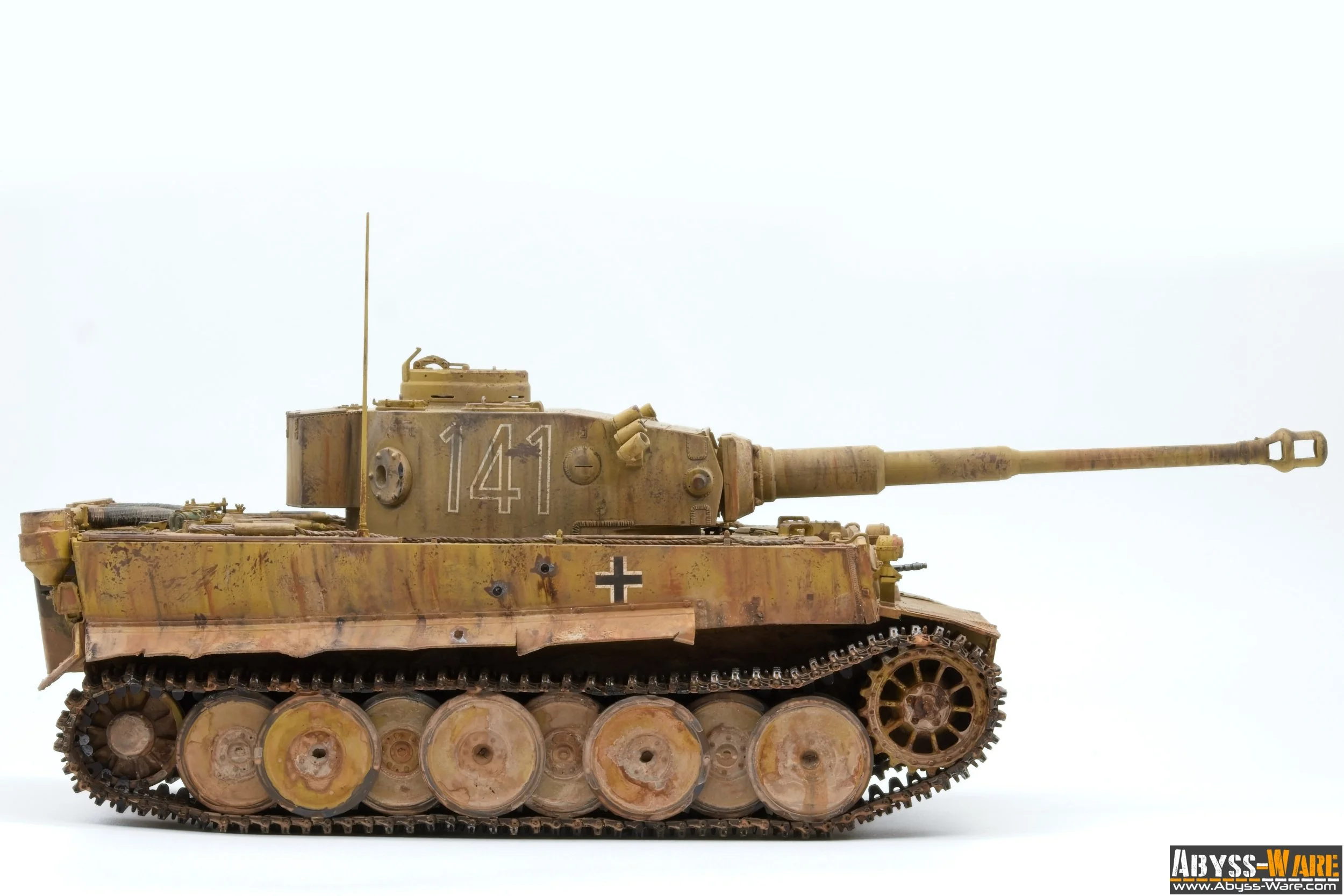 A detailed model of a German World War II tank with the number 141 and a black cross symbol, featuring rust and wear, against a plain white background.