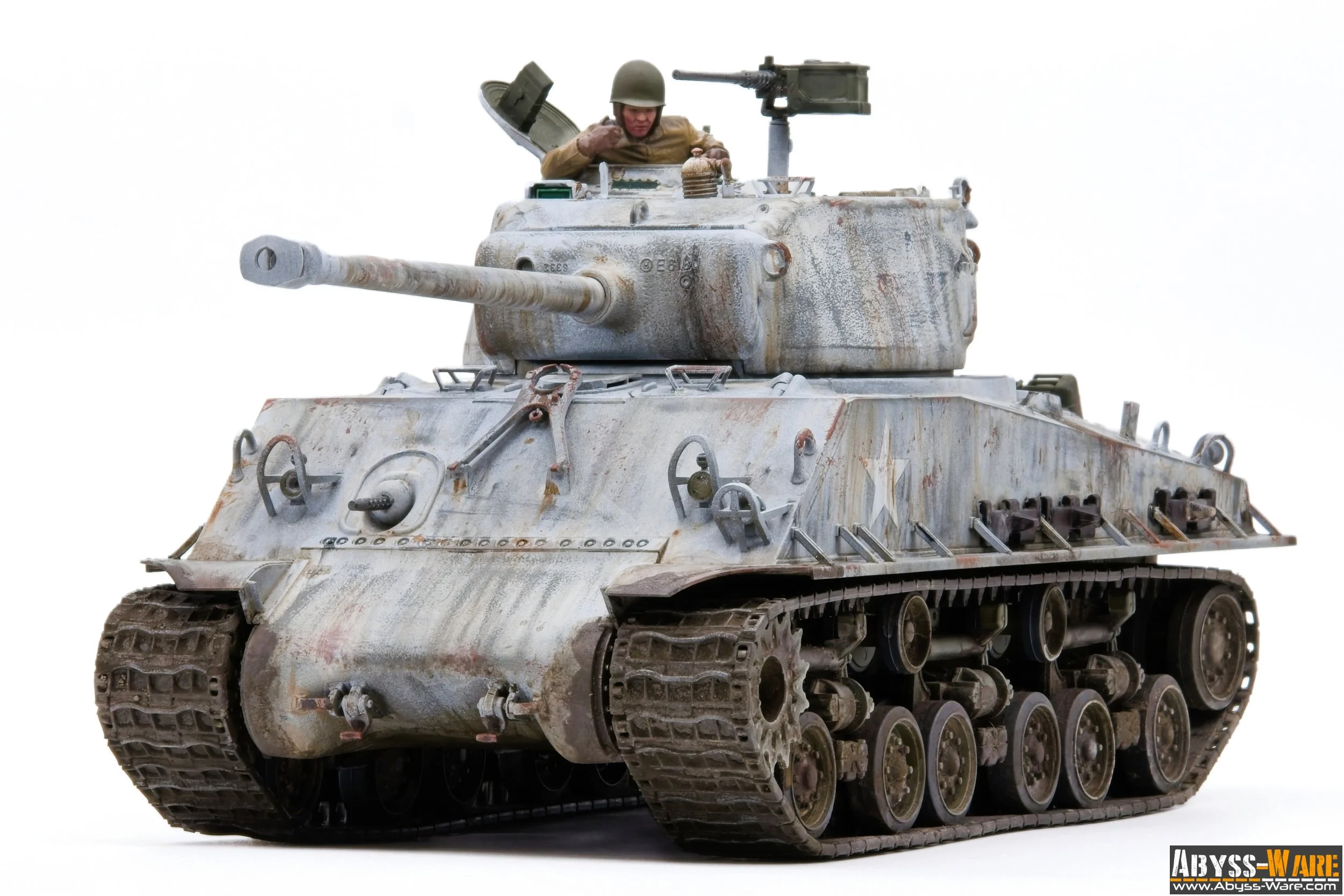 A detailed scale model of a weathered military tank with a soldier figurine in the turret, set against a white background. The tank has realistic rust, dirt effects, and a long barrel.