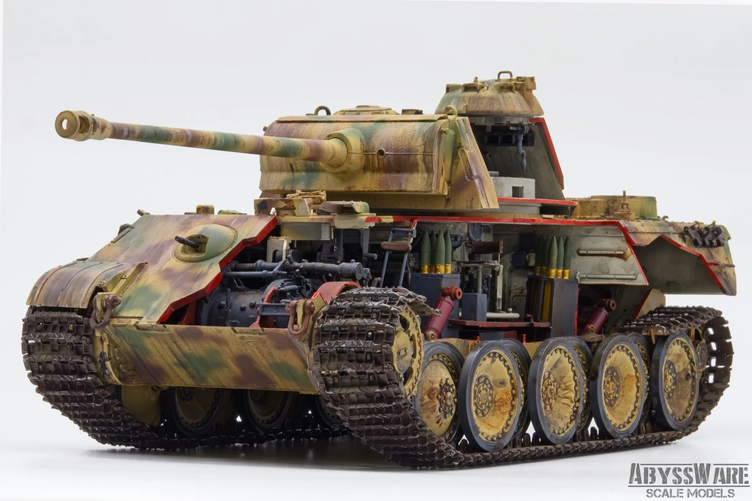 Scale model of a military tank painted in camouflage colors with visible internal details, set against a plain white background. The model is detailed with realistic weathering, and the logo 'AbyssWare Scale Models' is visible in the bottom right cor