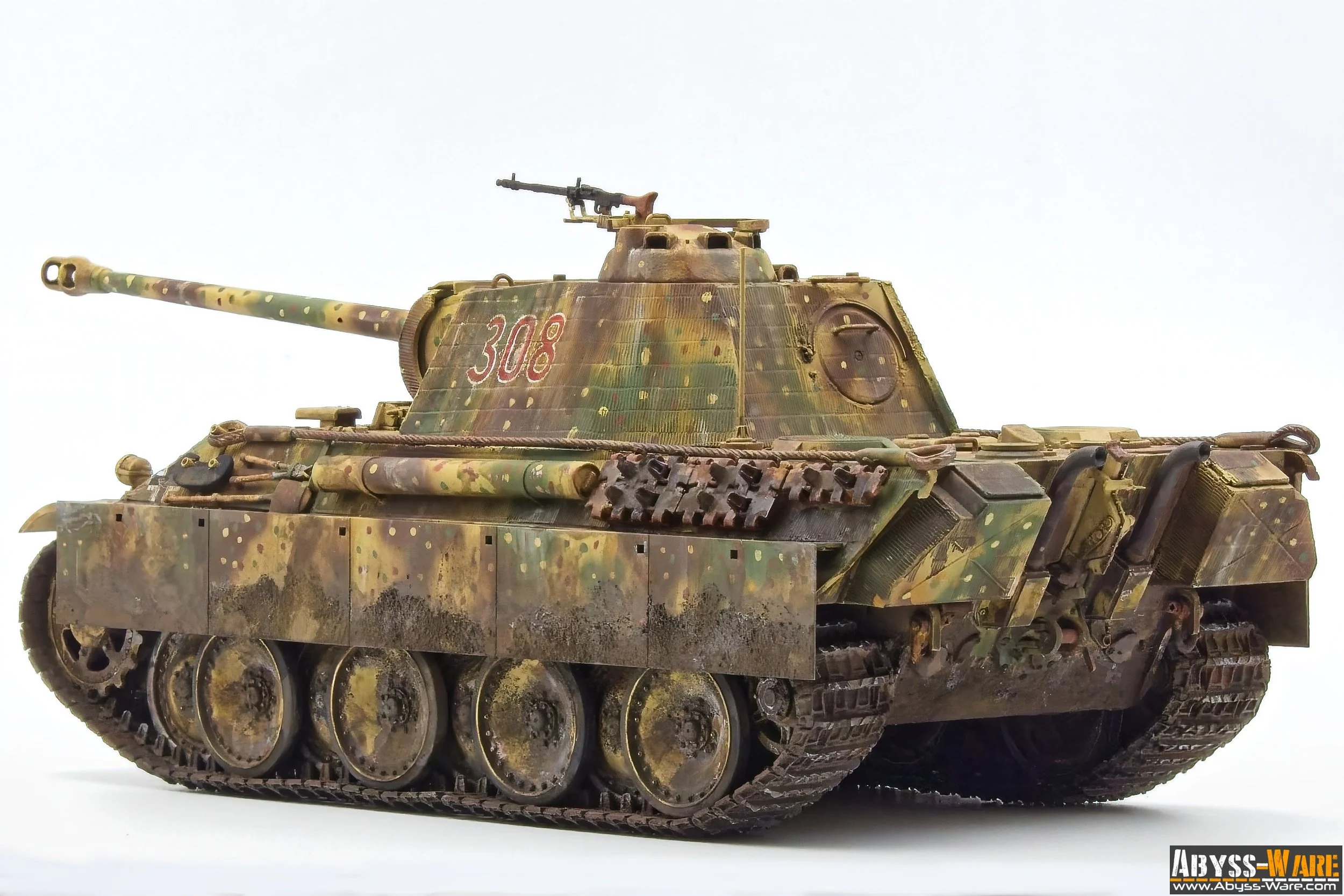 A model of a military tank with camouflage paint, the number 308 painted on its turret, and a long barrel, set against a plain white background.
