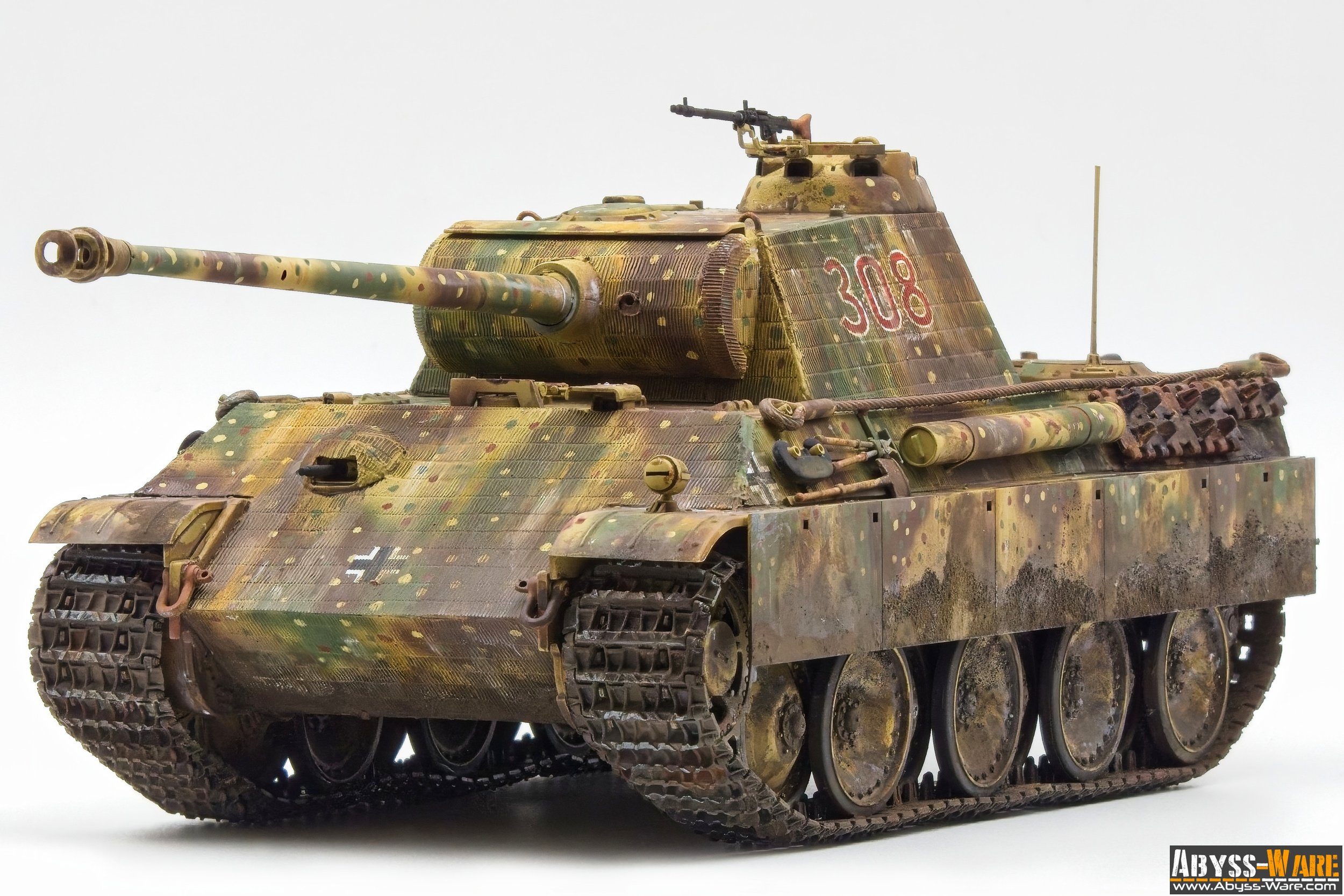 Model of a German WWII tank with camouflage paint, gun barrel pointing forward, and markings including red '308' and white cross.