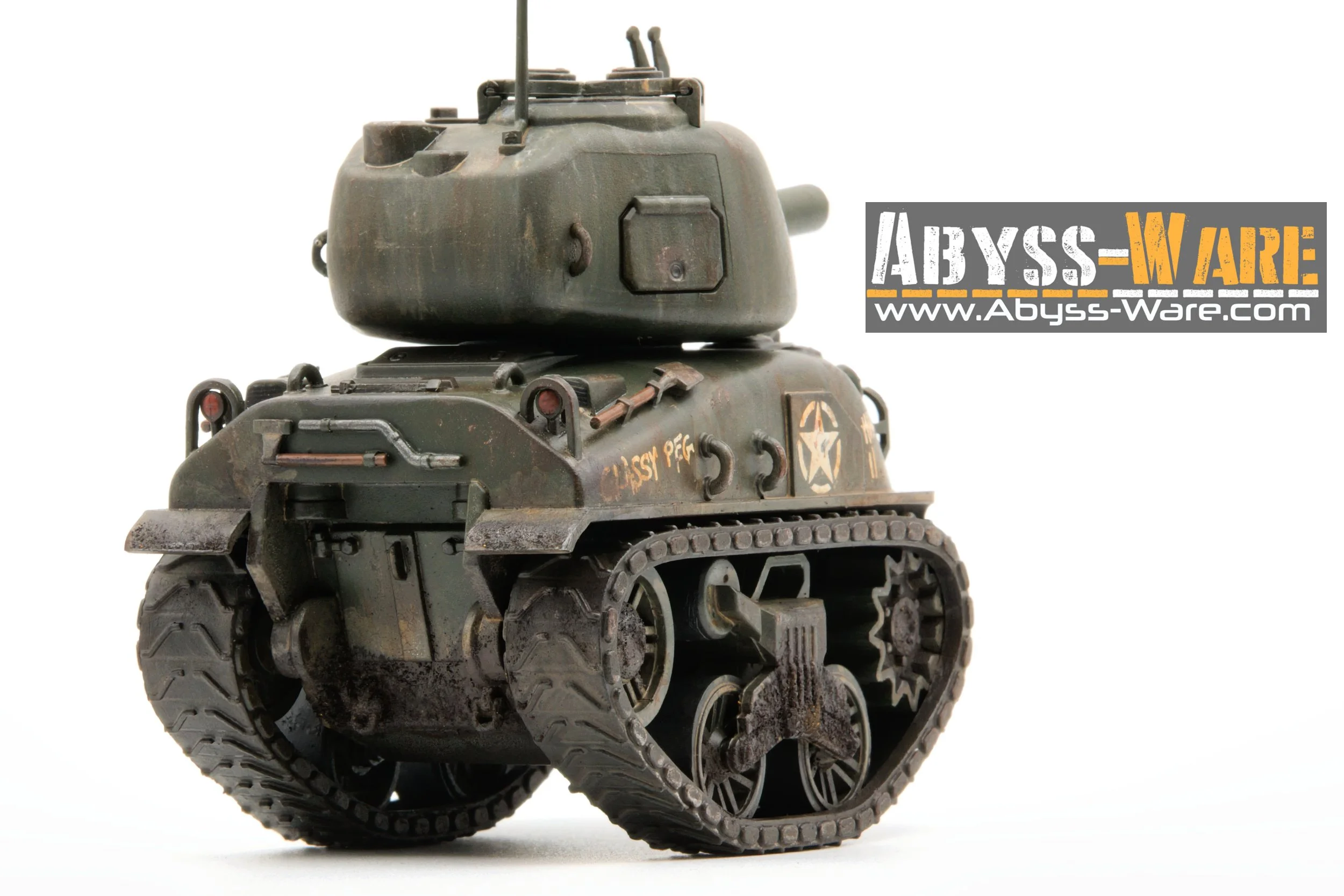 A small, detailed model of a military tank with tracks, a turret, and weathered green paint, labeled with 'ABYSS PEC' and a star insignia, positioned against a plain white background.