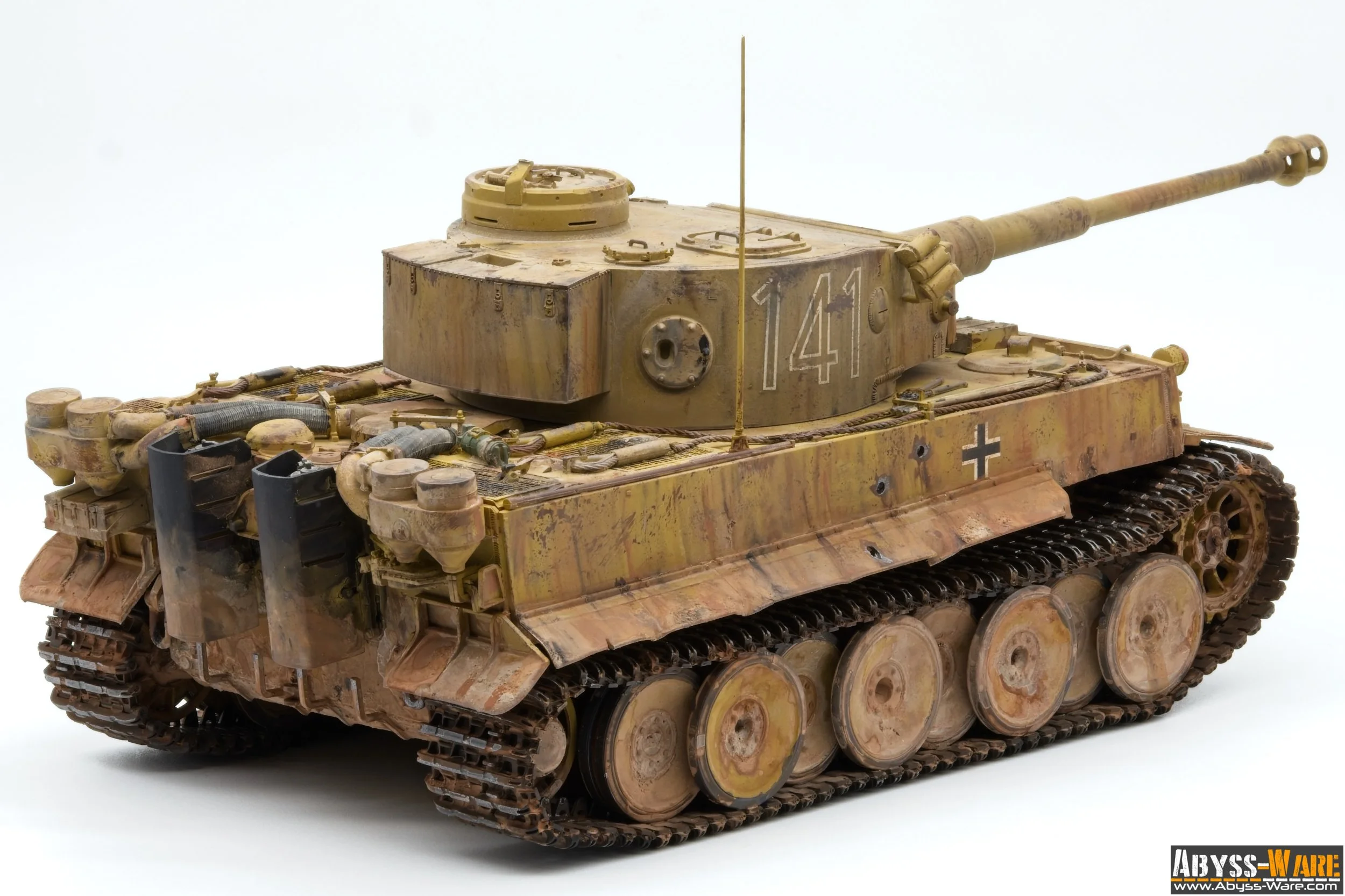 A detailed scale model of a World War II German tank, with a weathered yellow and brown paint job, markings including '141' and a black cross, and realistic features such as tracks, gun barrel, and maintenance hatches.