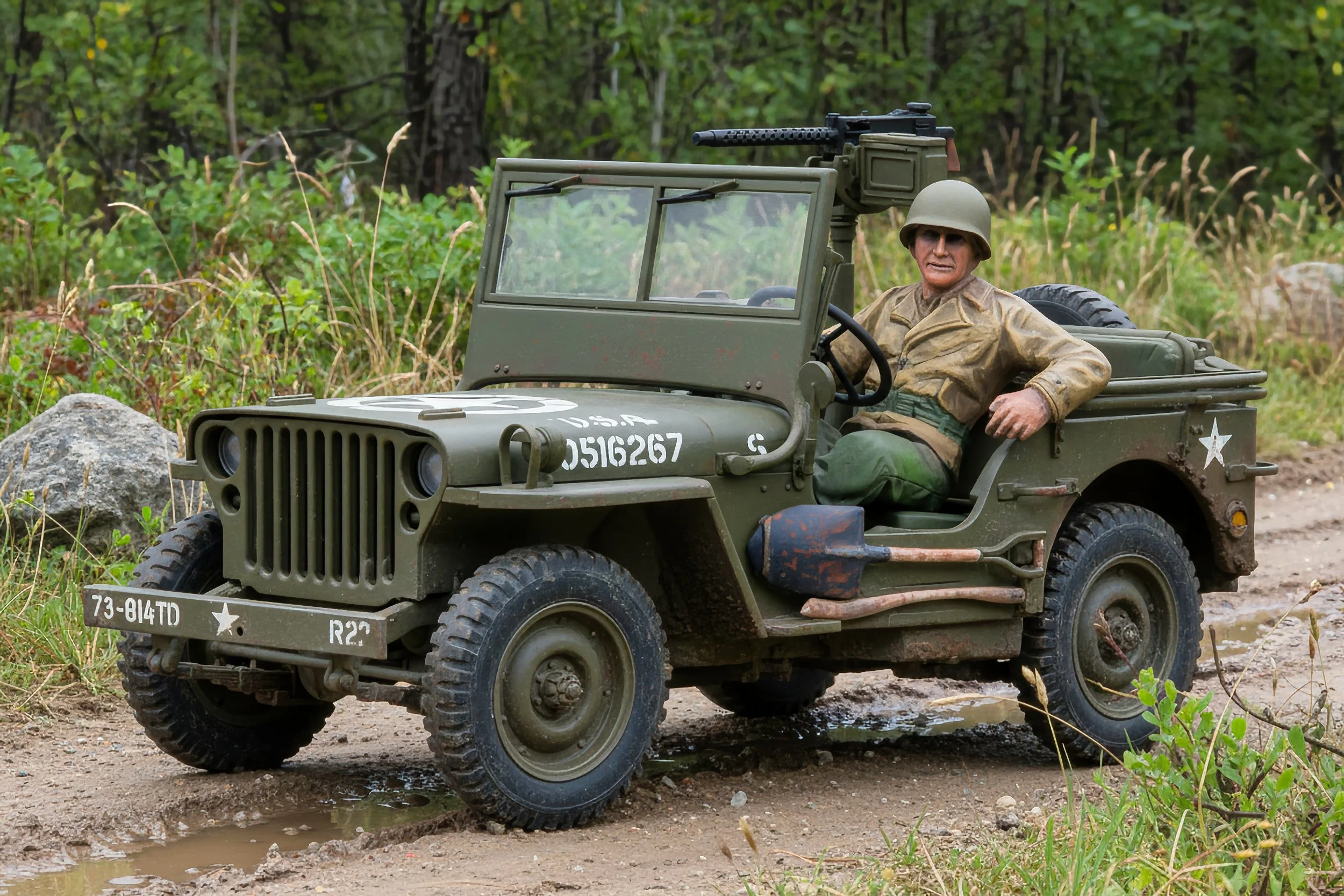 Model of a vintage military Jeep with a soldier figure in a woodland setting.
