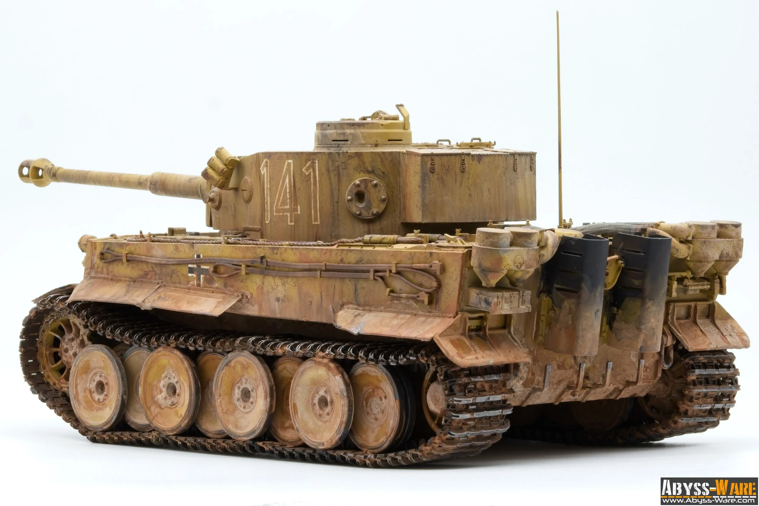 A scaled-down model of a military tank with a camouflage pattern, large tank tracks, a long barrel, and the number 141 painted on the turret.