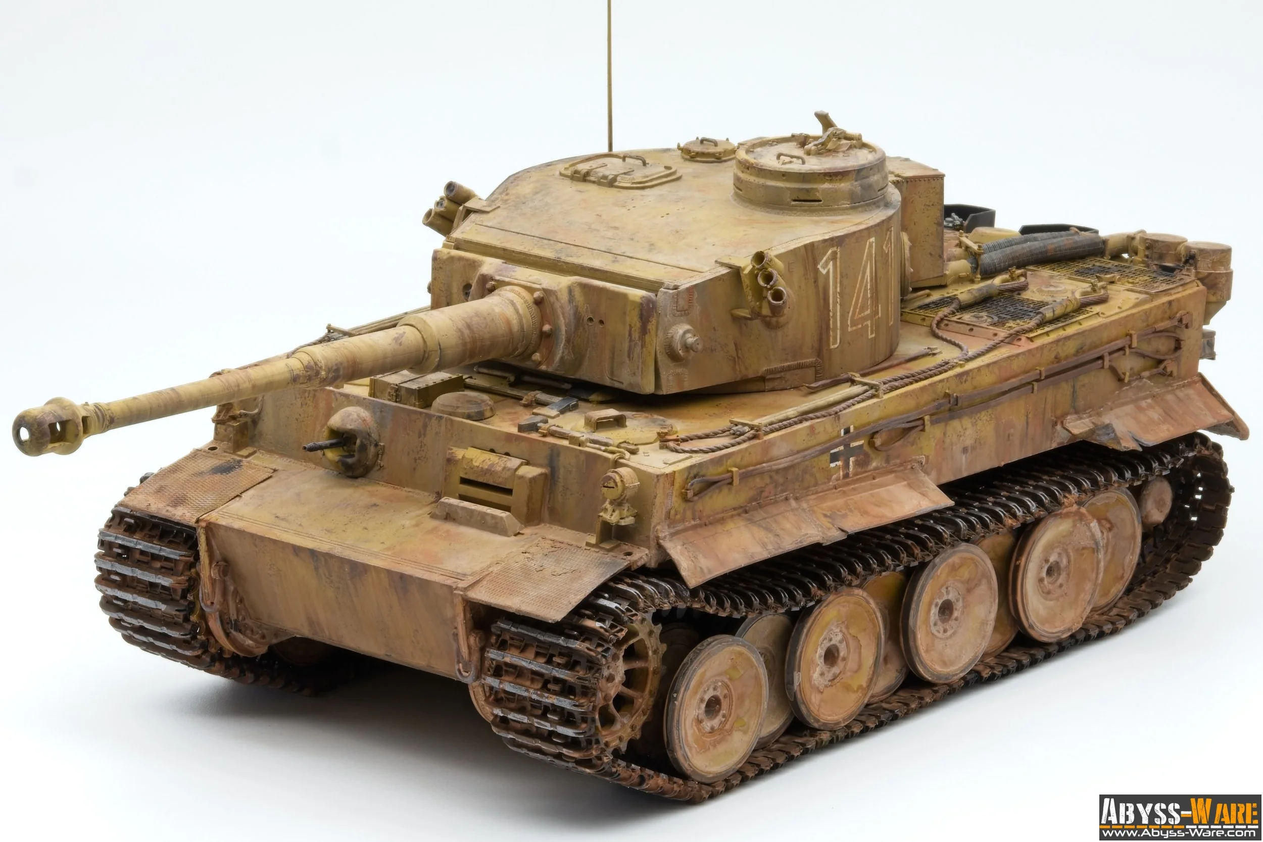 Model of a beige military tank with a long barrel, detailed tracks, and weathered surface, labeled with the number 14 on the turret.